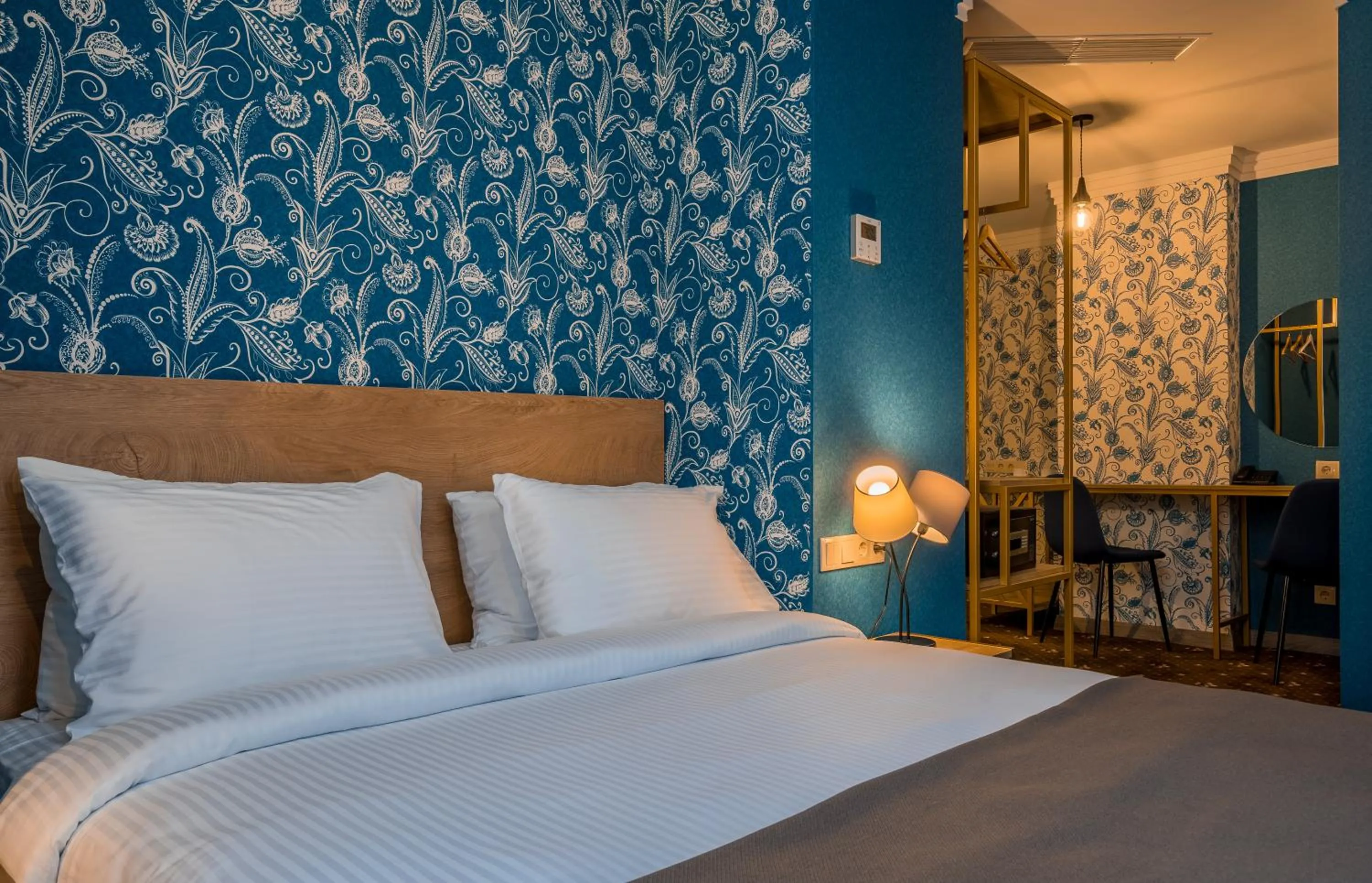 Bed in Gladius Inn Boutique Hotel by DNT Group