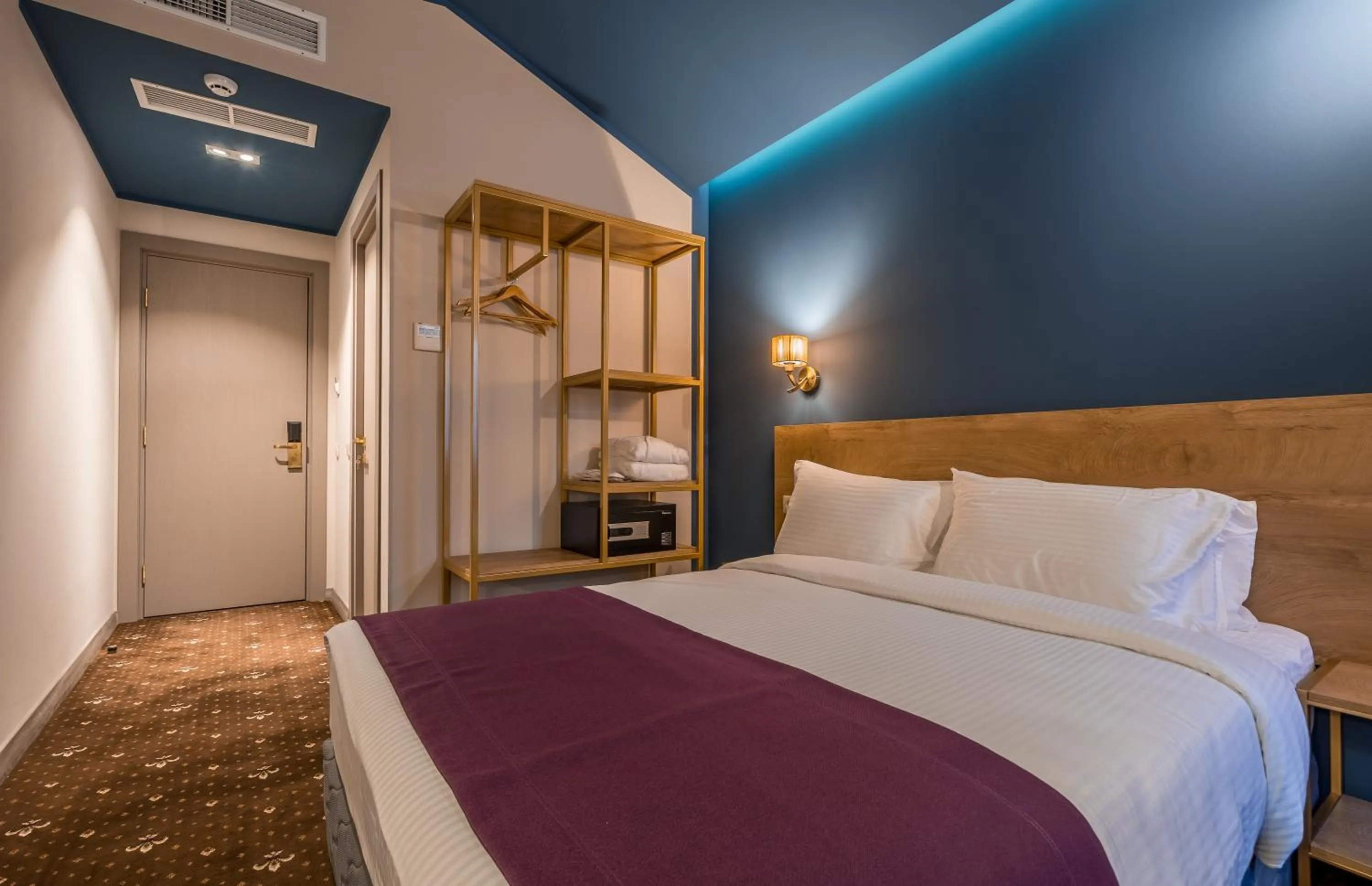 Bed in Gladius Inn Boutique Hotel by DNT Group