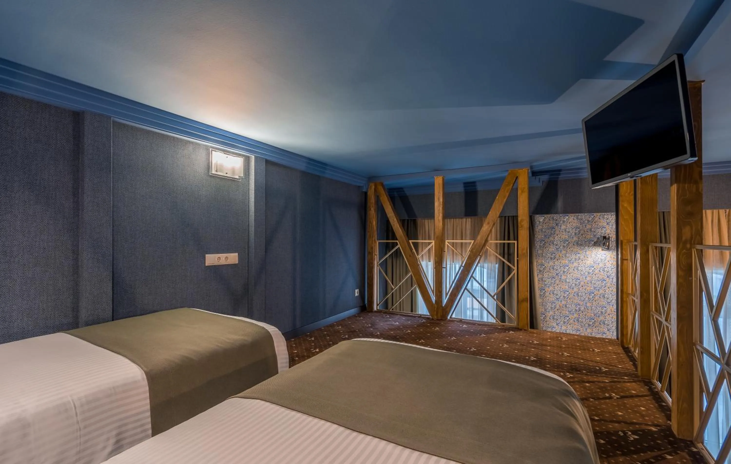 Bed in Gladius Inn Boutique Hotel by DNT Group