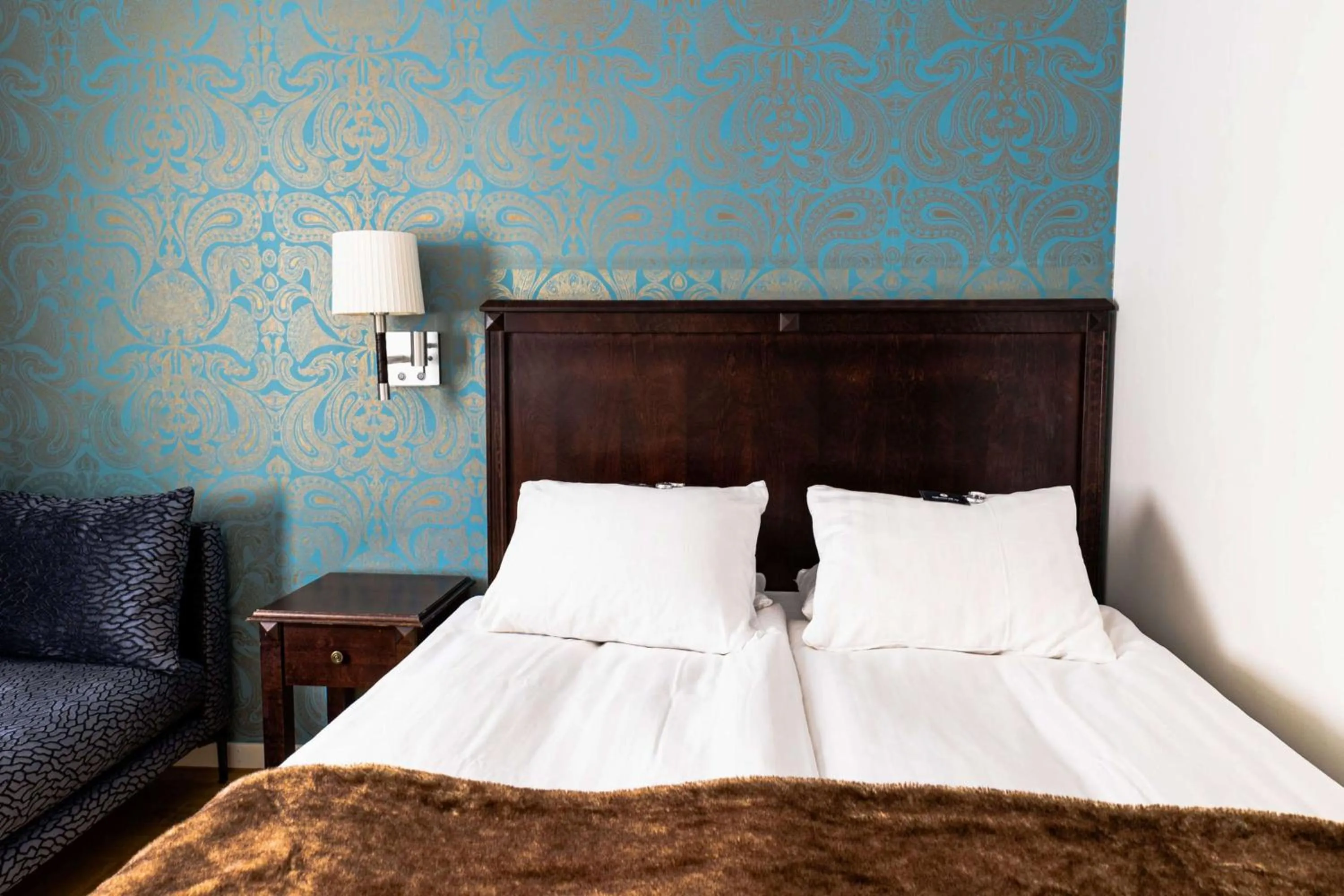 Bedroom, Bed in Vimmerby Stadshotell, WorldHotels Crafted