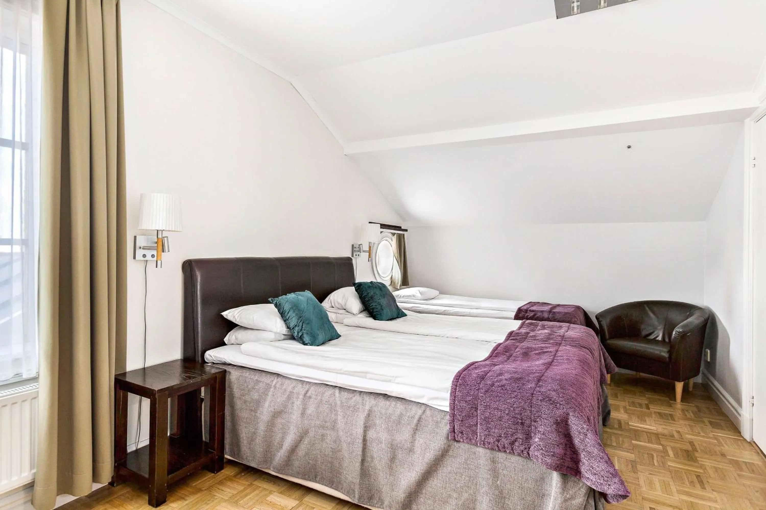 Bedroom, Bed in Vimmerby Stadshotell, WorldHotels Crafted
