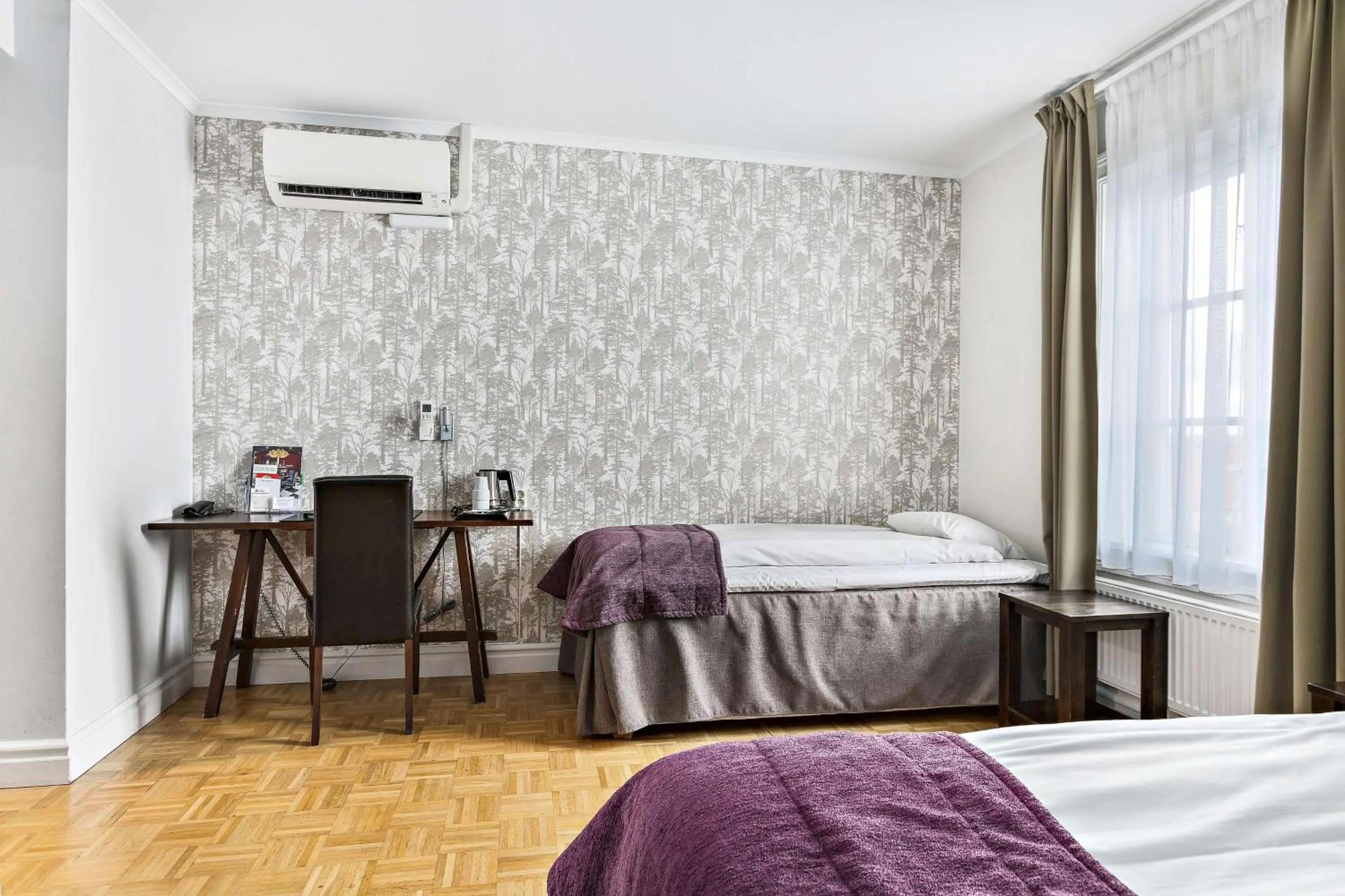 Bedroom, Bed in Vimmerby Stadshotell, WorldHotels Crafted