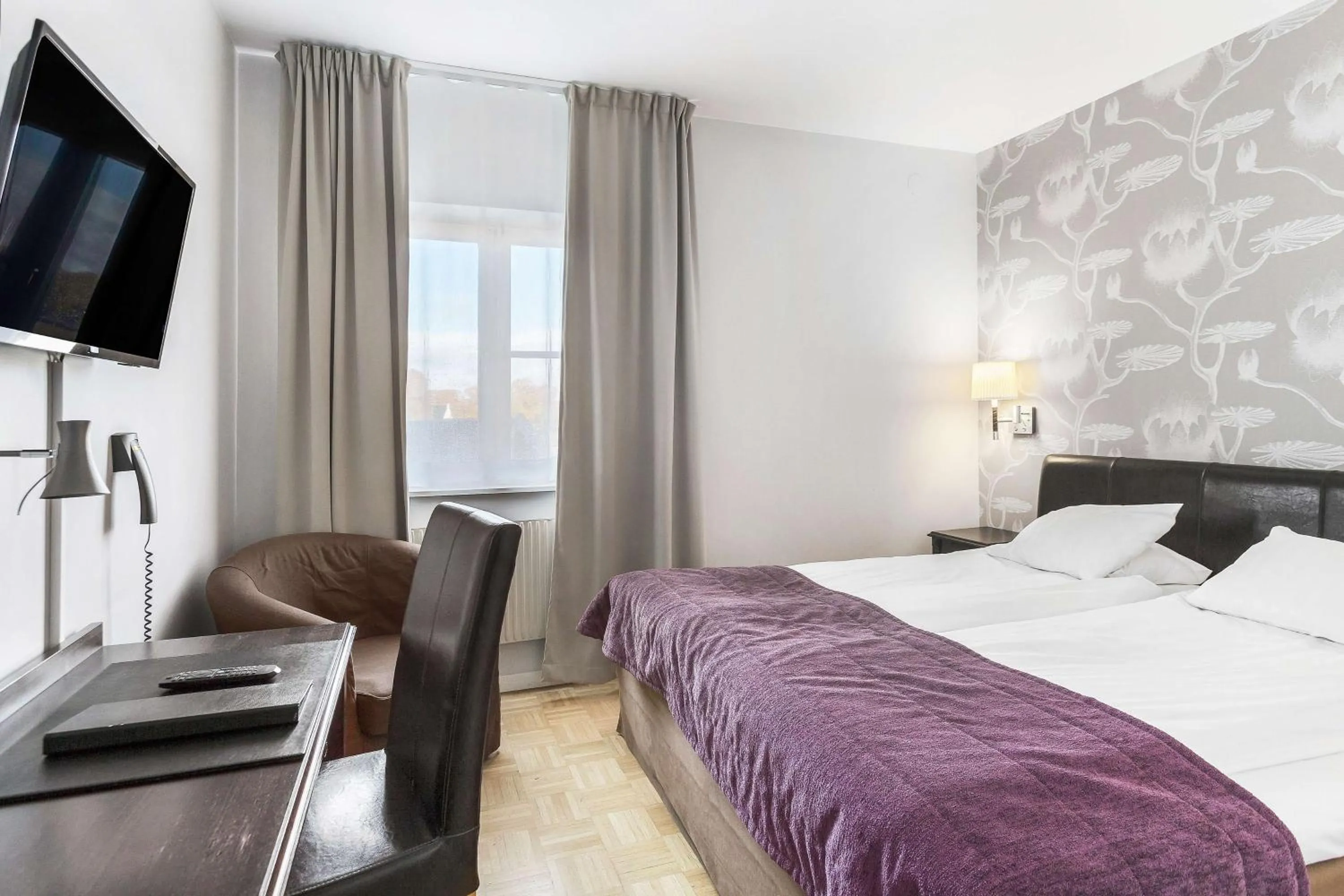 Bedroom, Bed in Vimmerby Stadshotell, WorldHotels Crafted