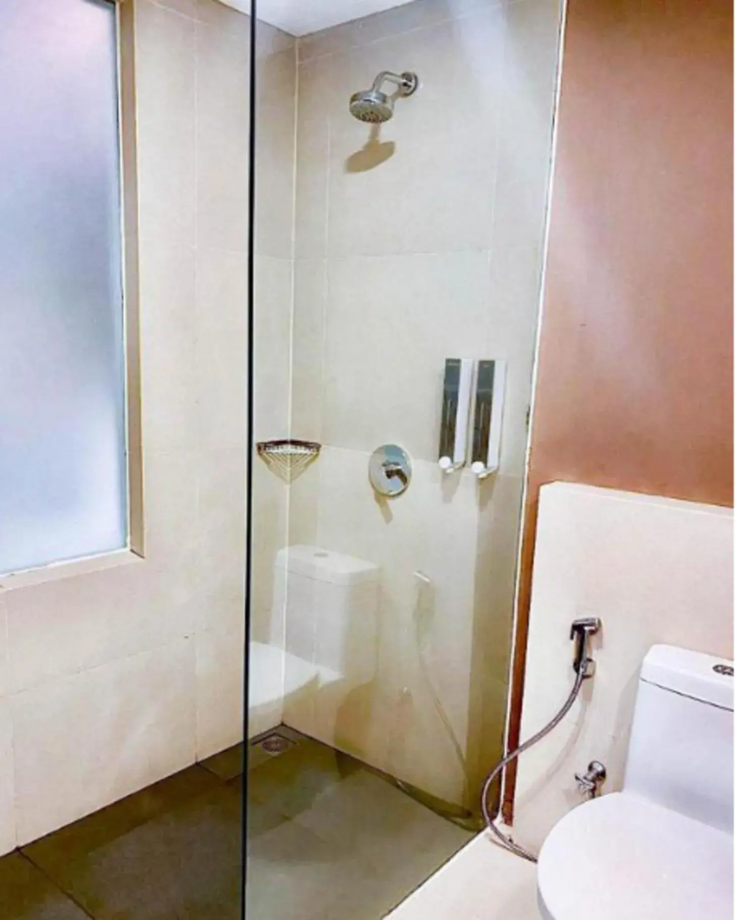 Bathroom in Harper Palembang by ASTON Bathroom in Harper Palembang by ASTON