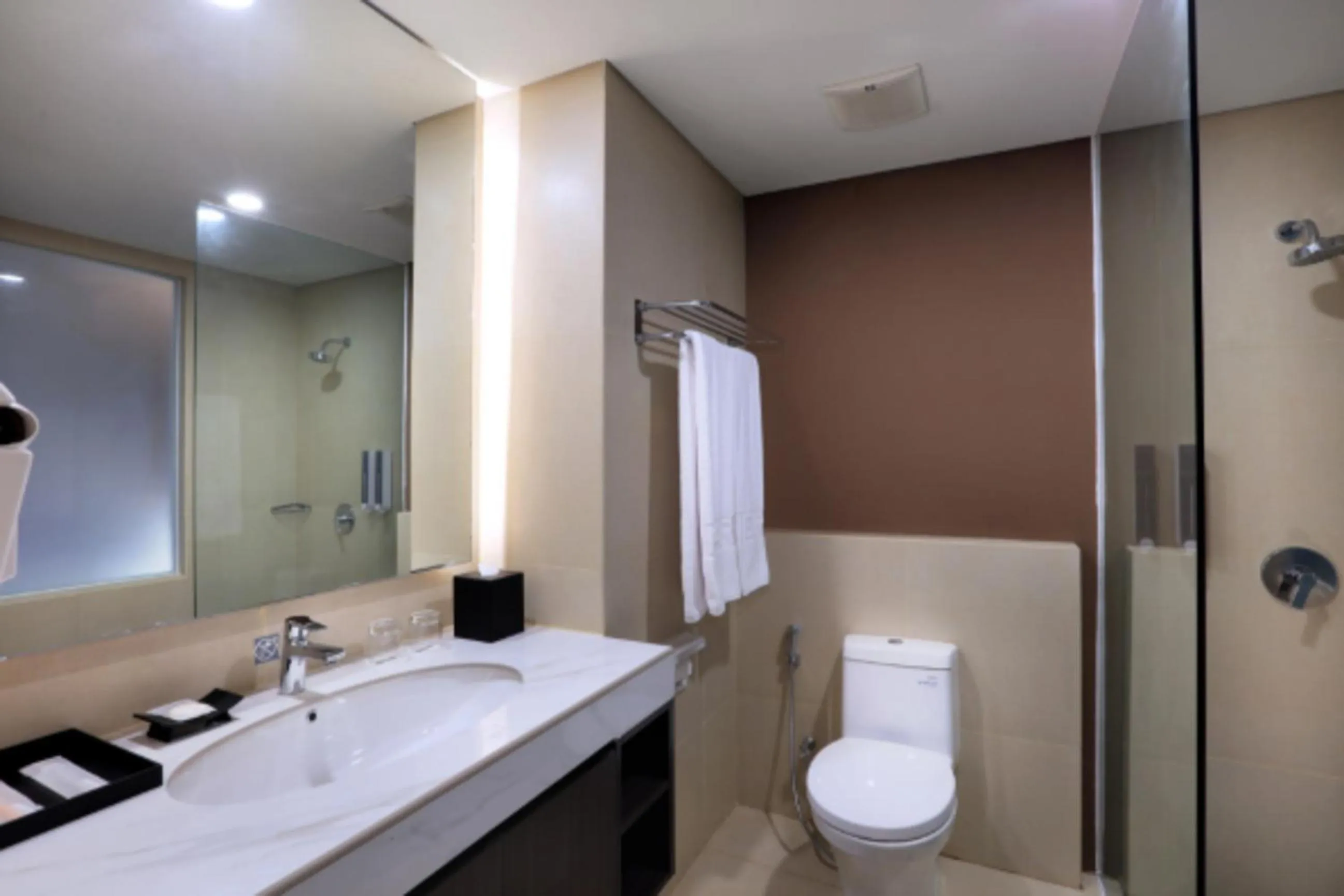Bathroom in Harper Palembang by ASTON