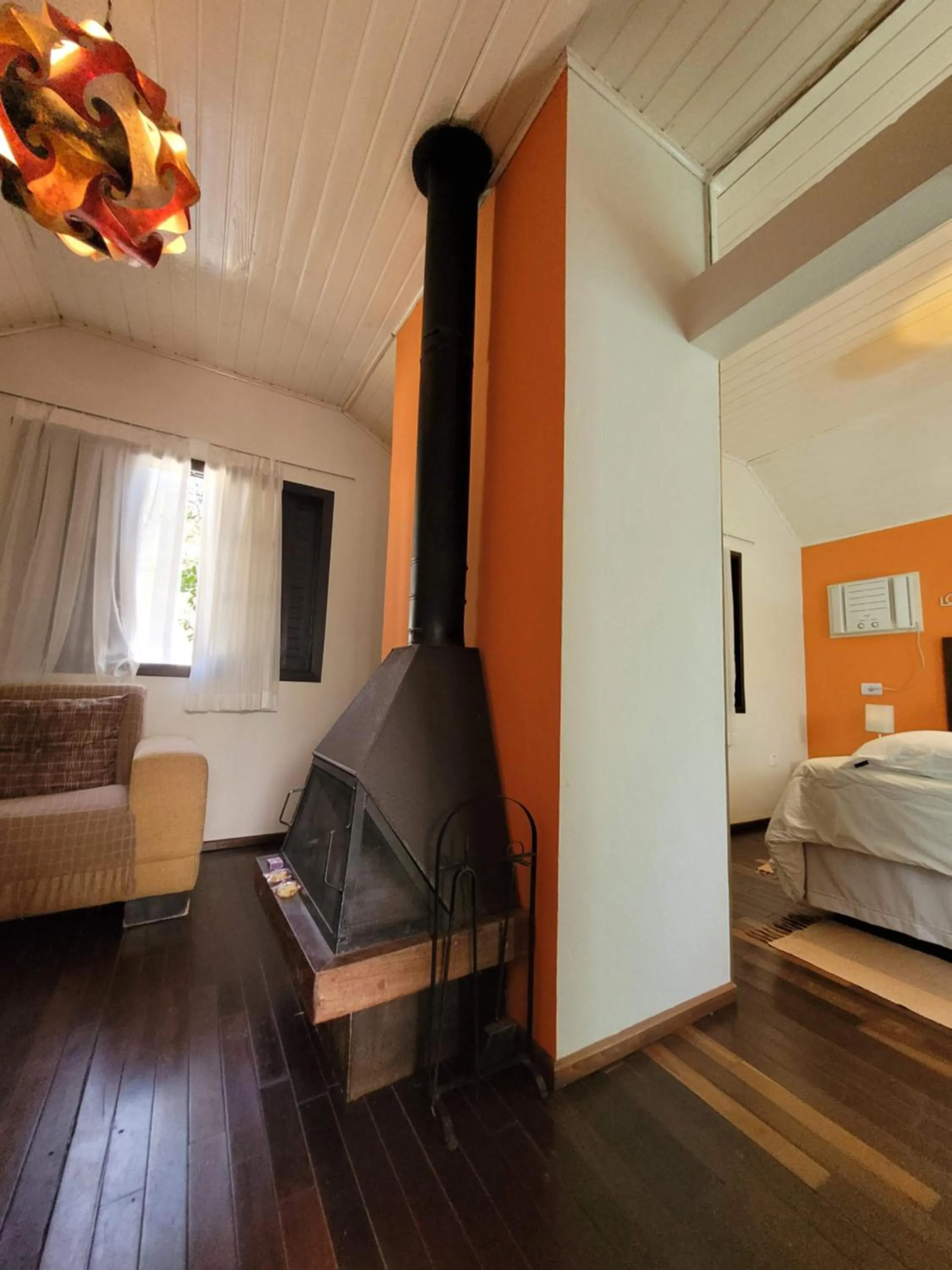 Living room, Bed in Pousada Vila Santa Barbara