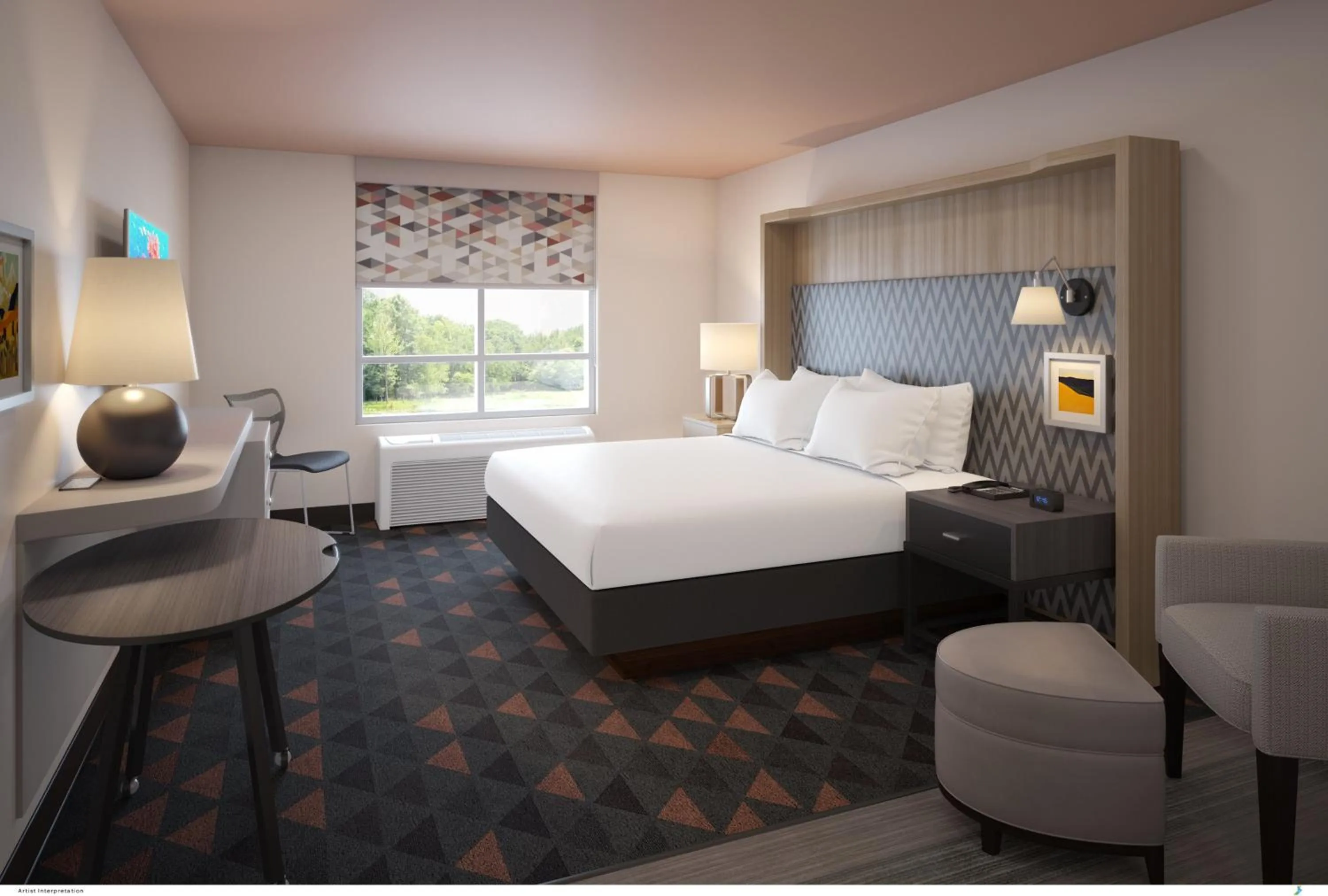 Photo of the whole room, Bed in Holiday Inn & Suites - Fayetteville W-Fort Bragg Area by IHG