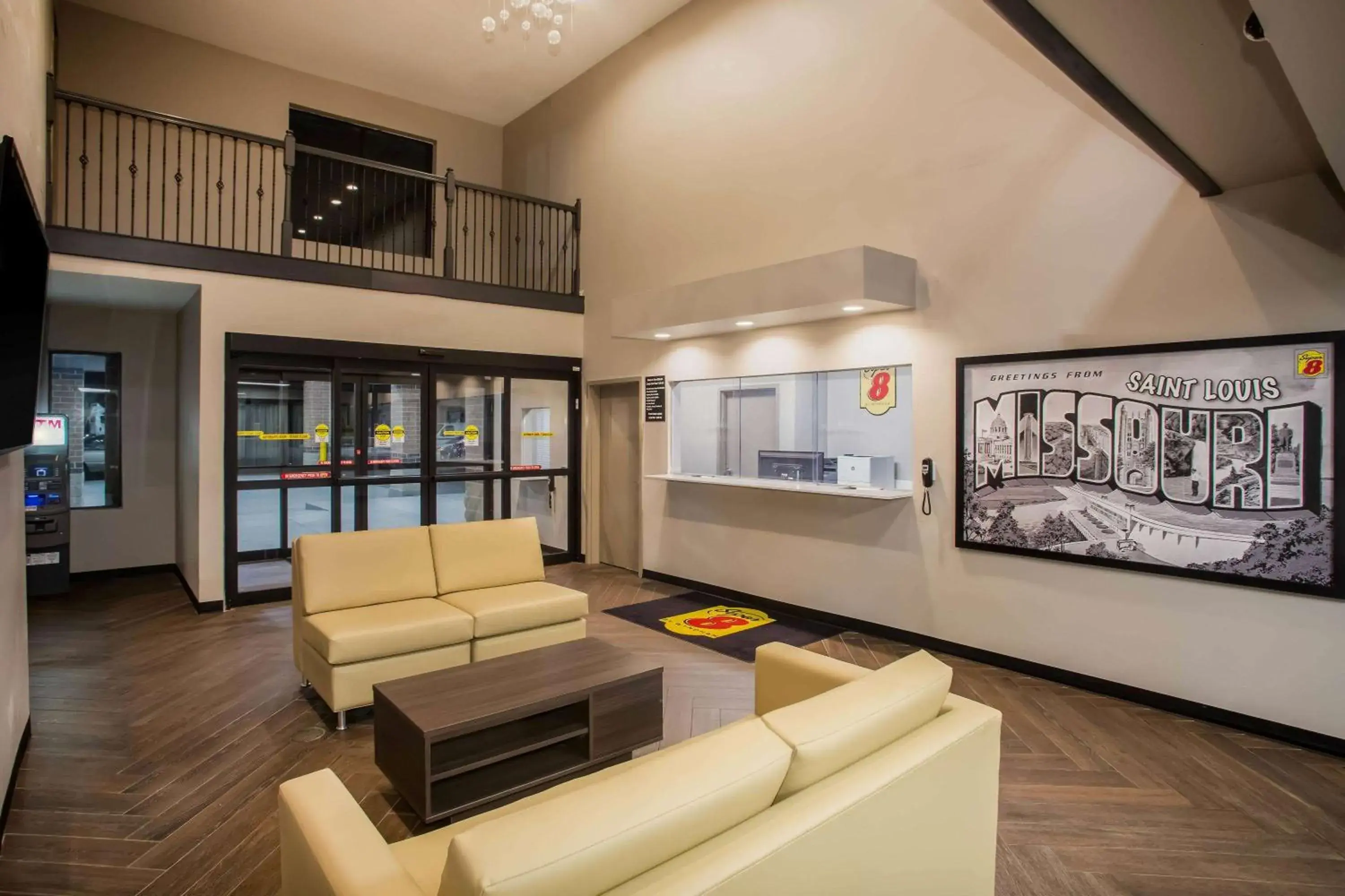 Lobby or reception in Super 8 by Wyndham St. Louis North Lobby or reception in Super 8 by Wyndham St. Louis North
