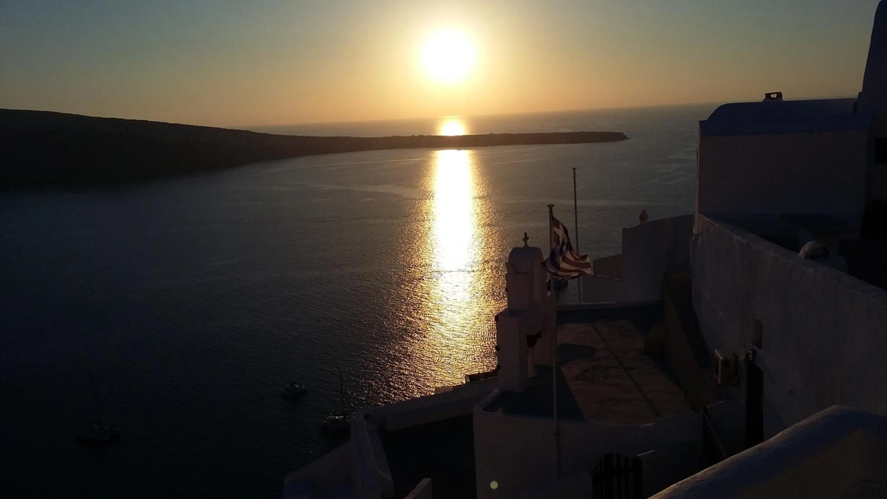 Sunset in Fotinos Houses