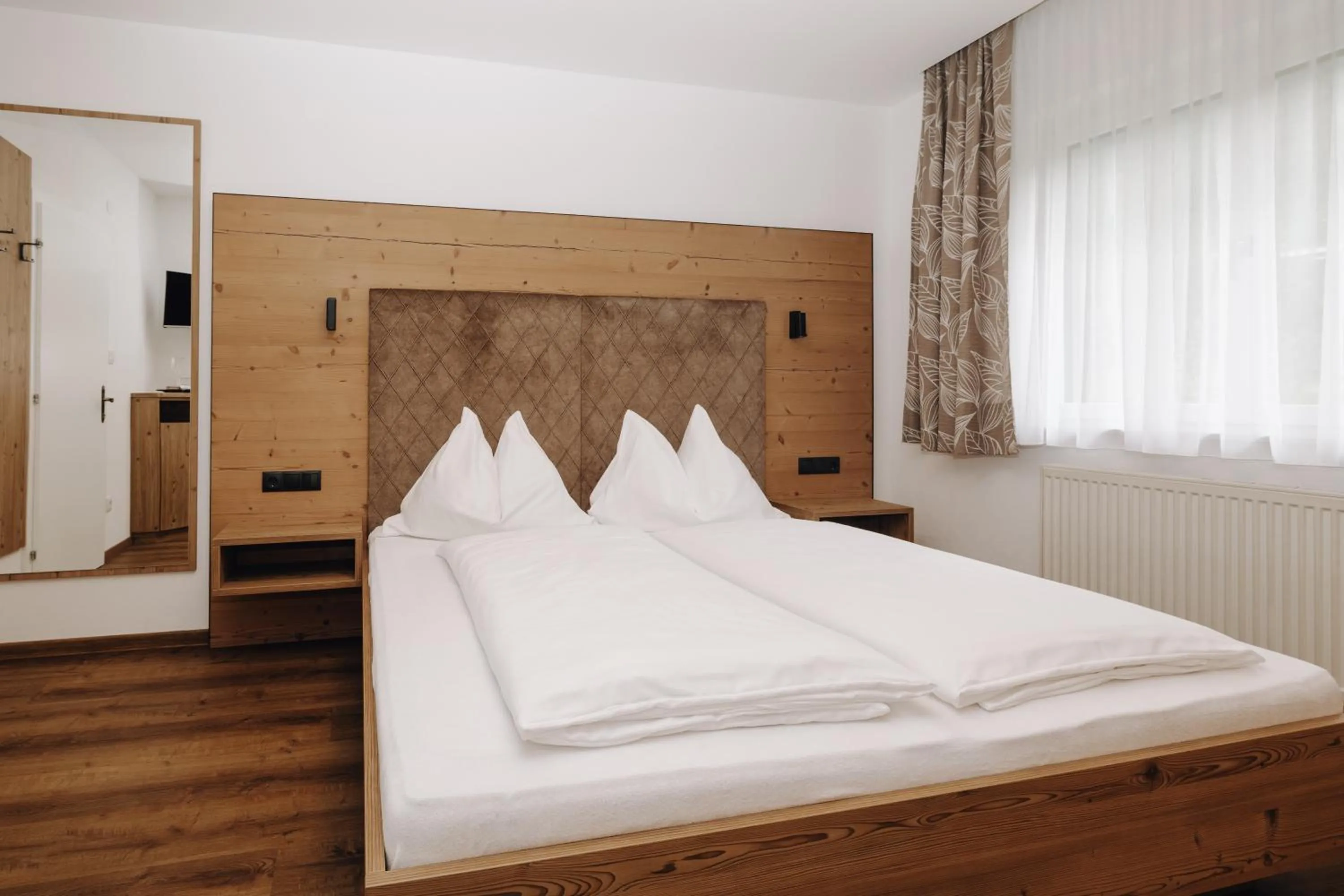 Bed in Hotel Garni Tannenhof