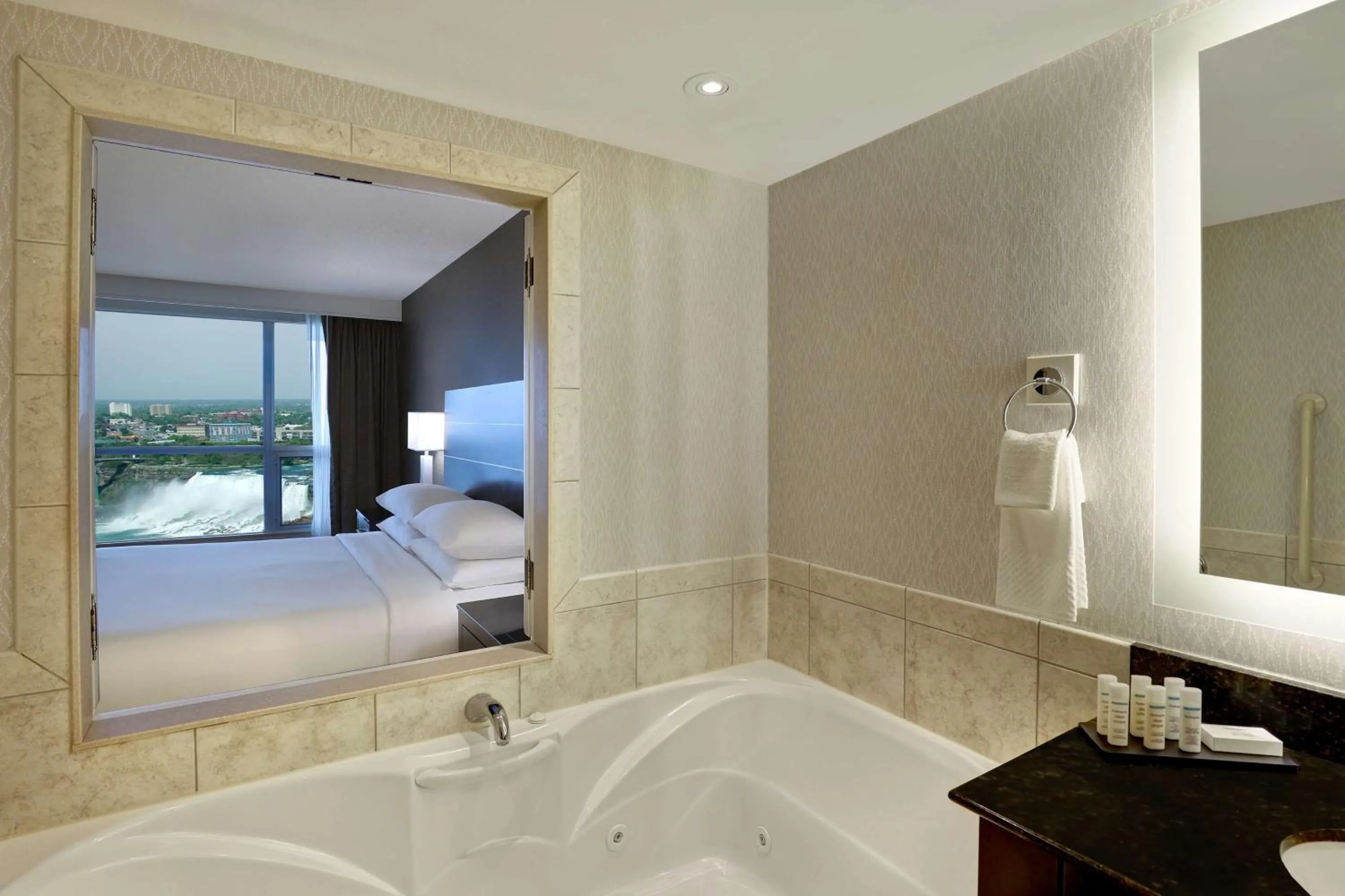 Bathroom, Bed in Embassy Suites by Hilton Niagara Falls/ Fallsview