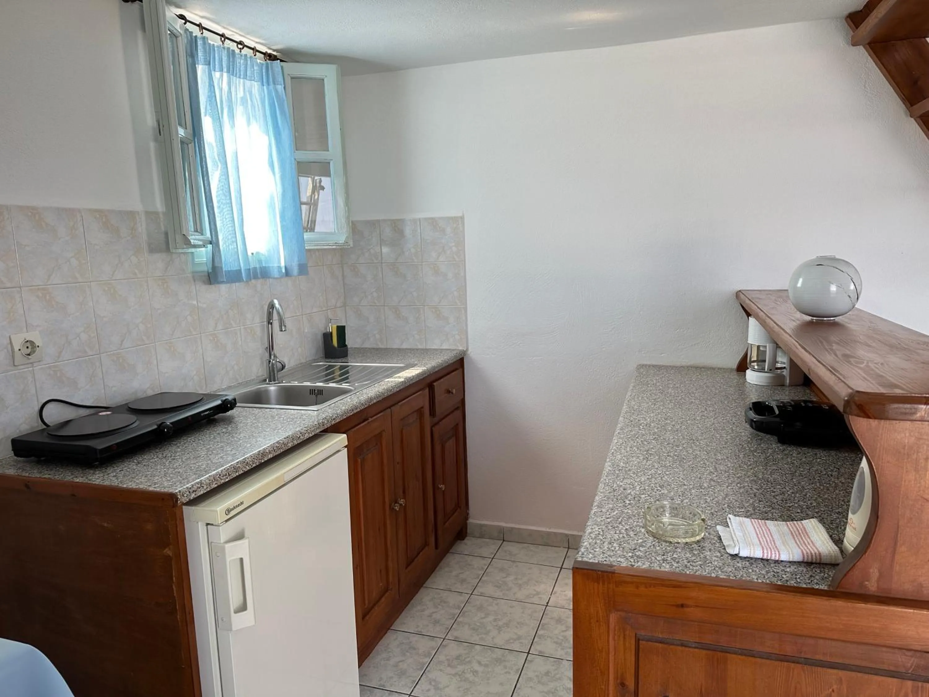 Kitchen or kitchenette in Hotel Paradisos Oia