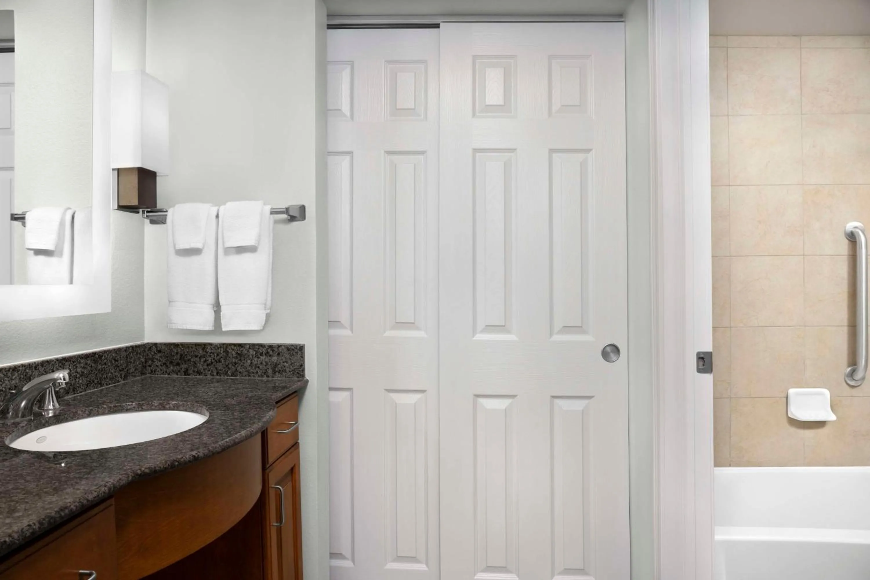 Bathroom in Homewood Suites by Hilton Omaha - Downtown