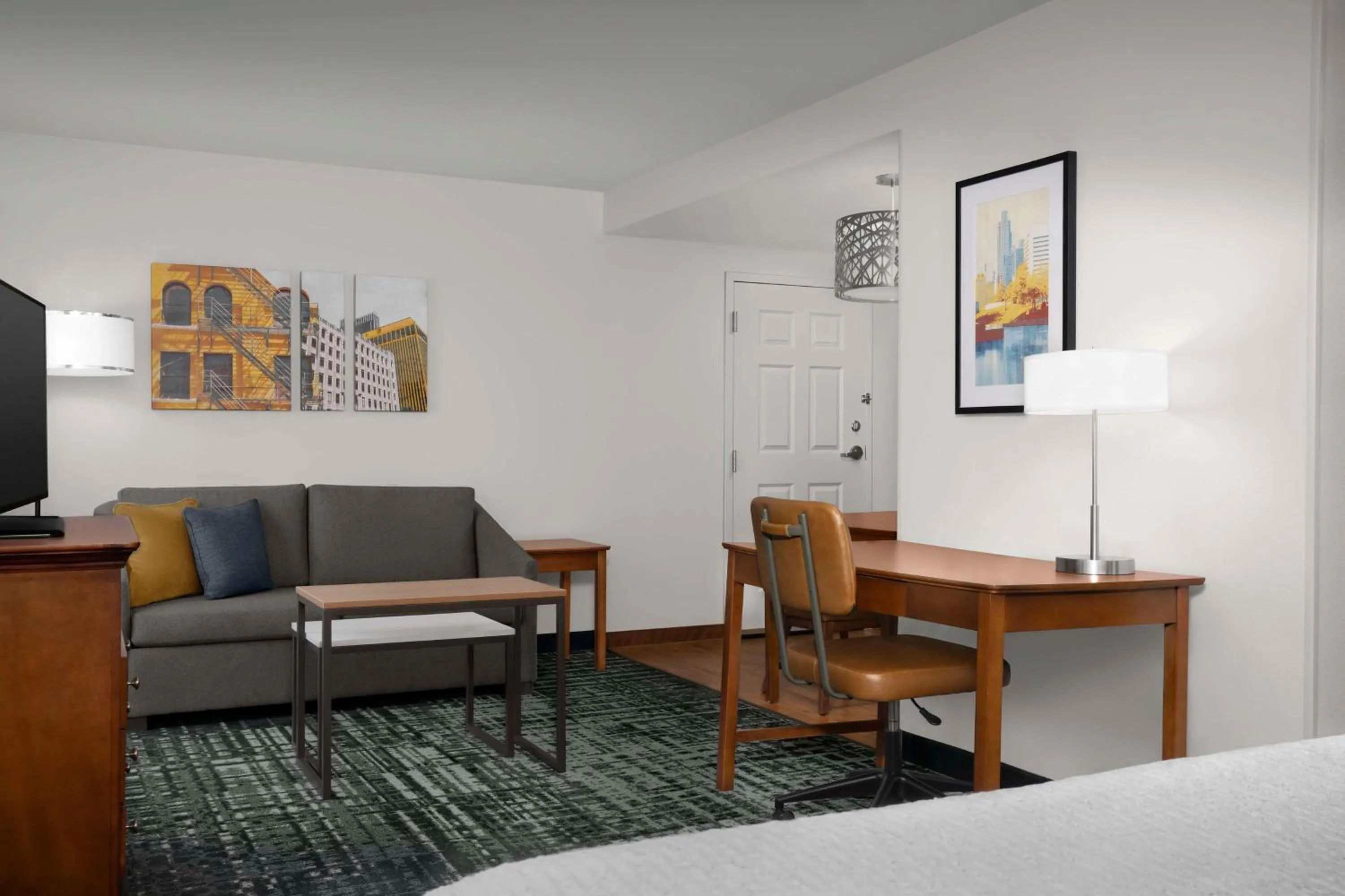 Living room, Bed in Homewood Suites by Hilton Omaha - Downtown