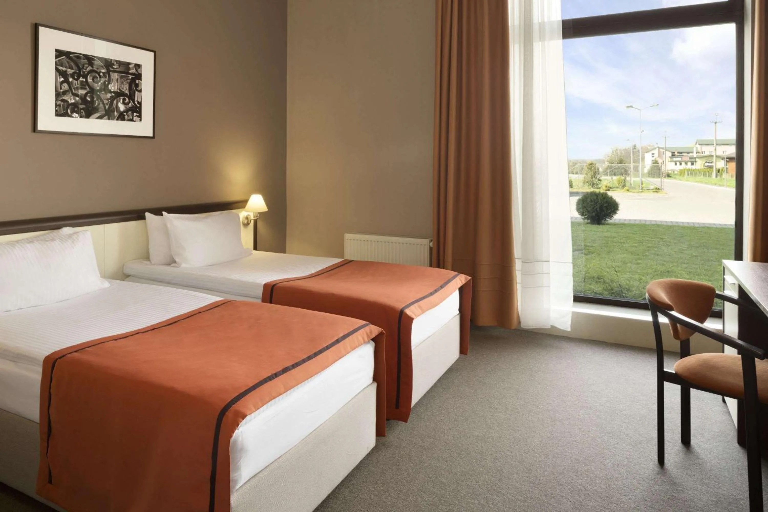 Photo of the whole room, Bed in Lviv Ramada Hotel