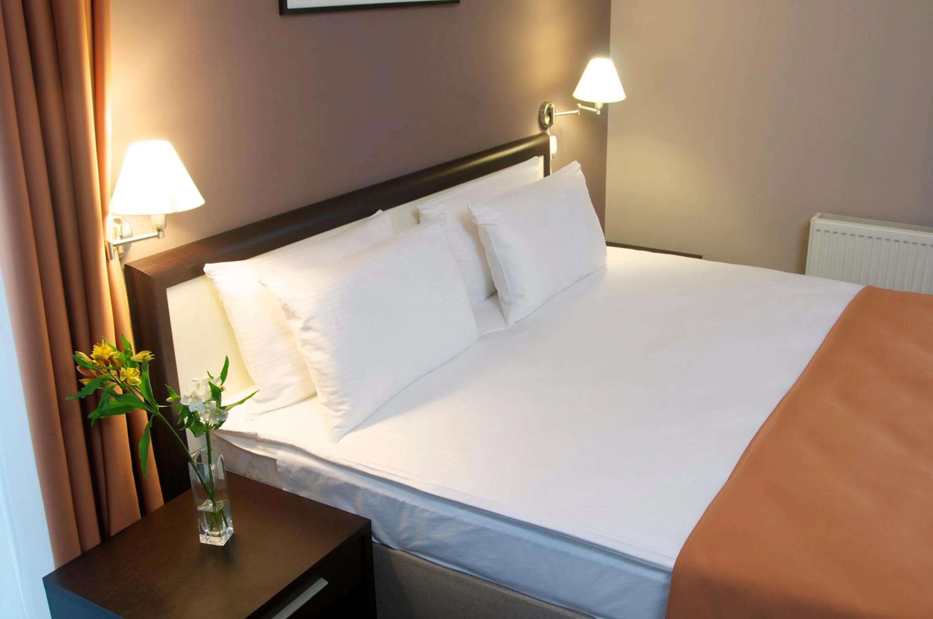 Photo of the whole room, Bed in Lviv Ramada Hotel