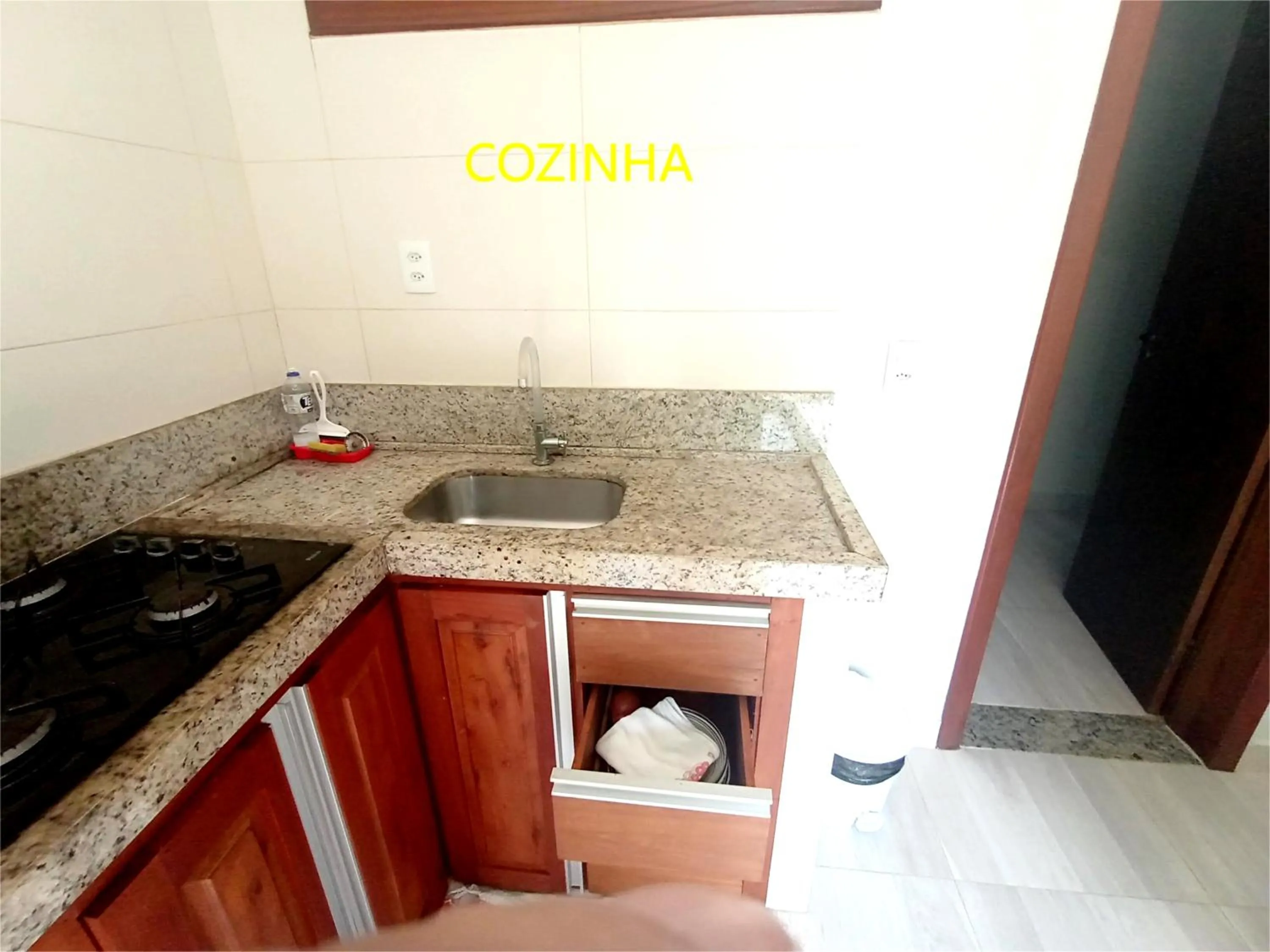 Kitchen or kitchenette in Pousada Lagoa Flat