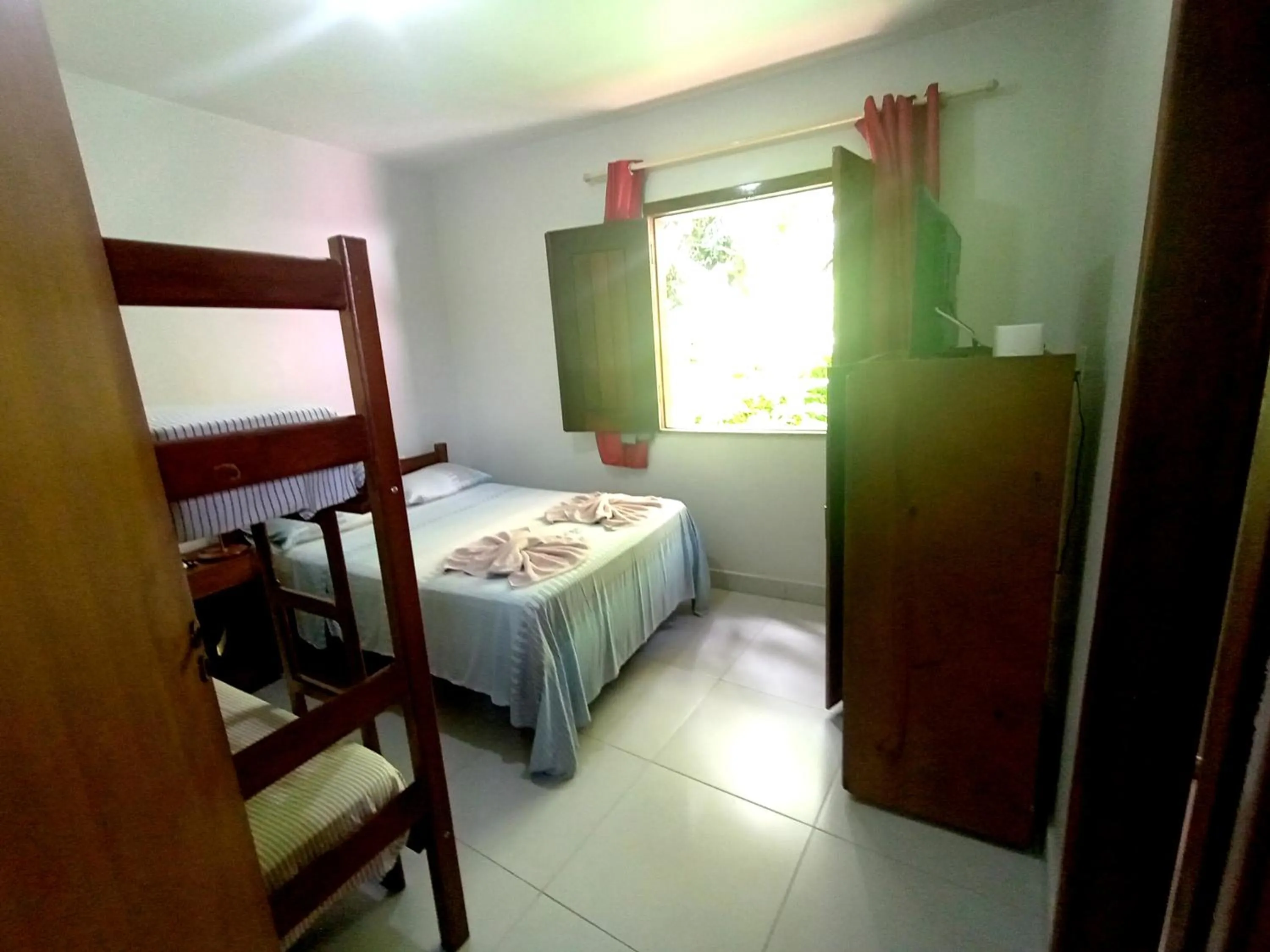 Photo of the whole room, Bed in Pousada Lagoa Flat