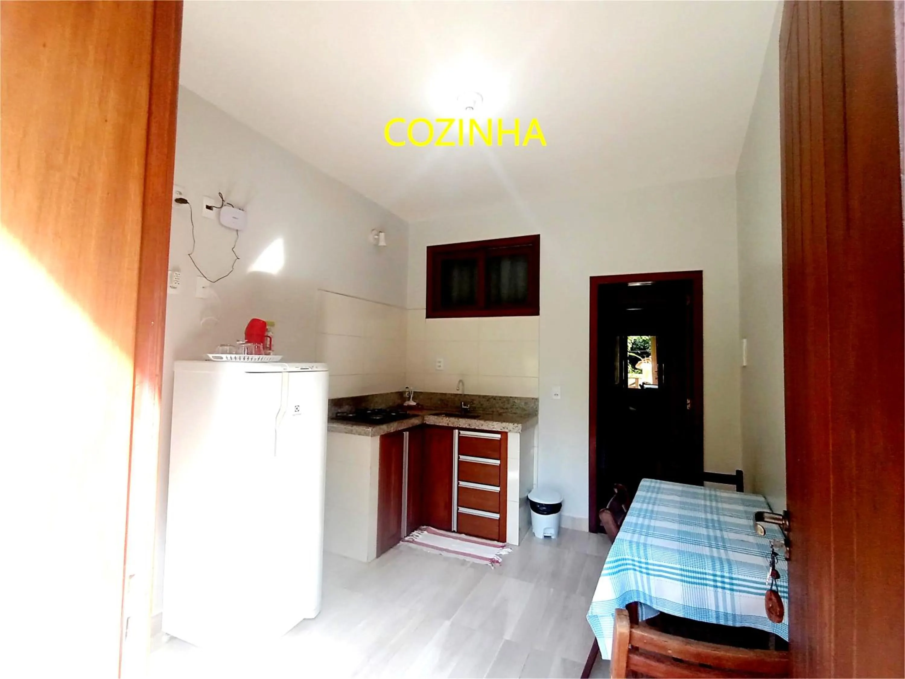 Kitchen or kitchenette, Bed in Pousada Lagoa Flat