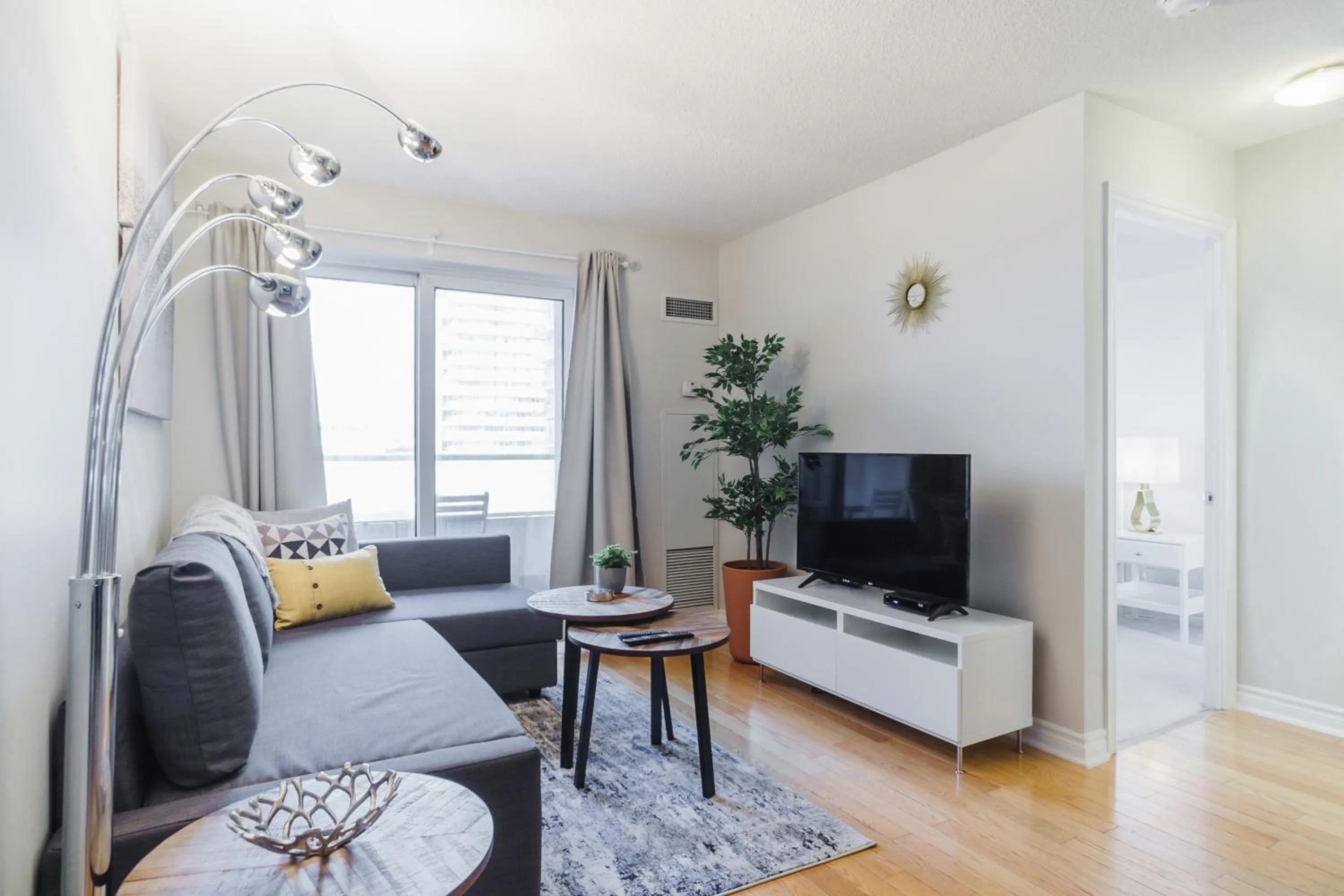 Communal lounge/ TV room in AOC Suites - Heart of Downtown Condo