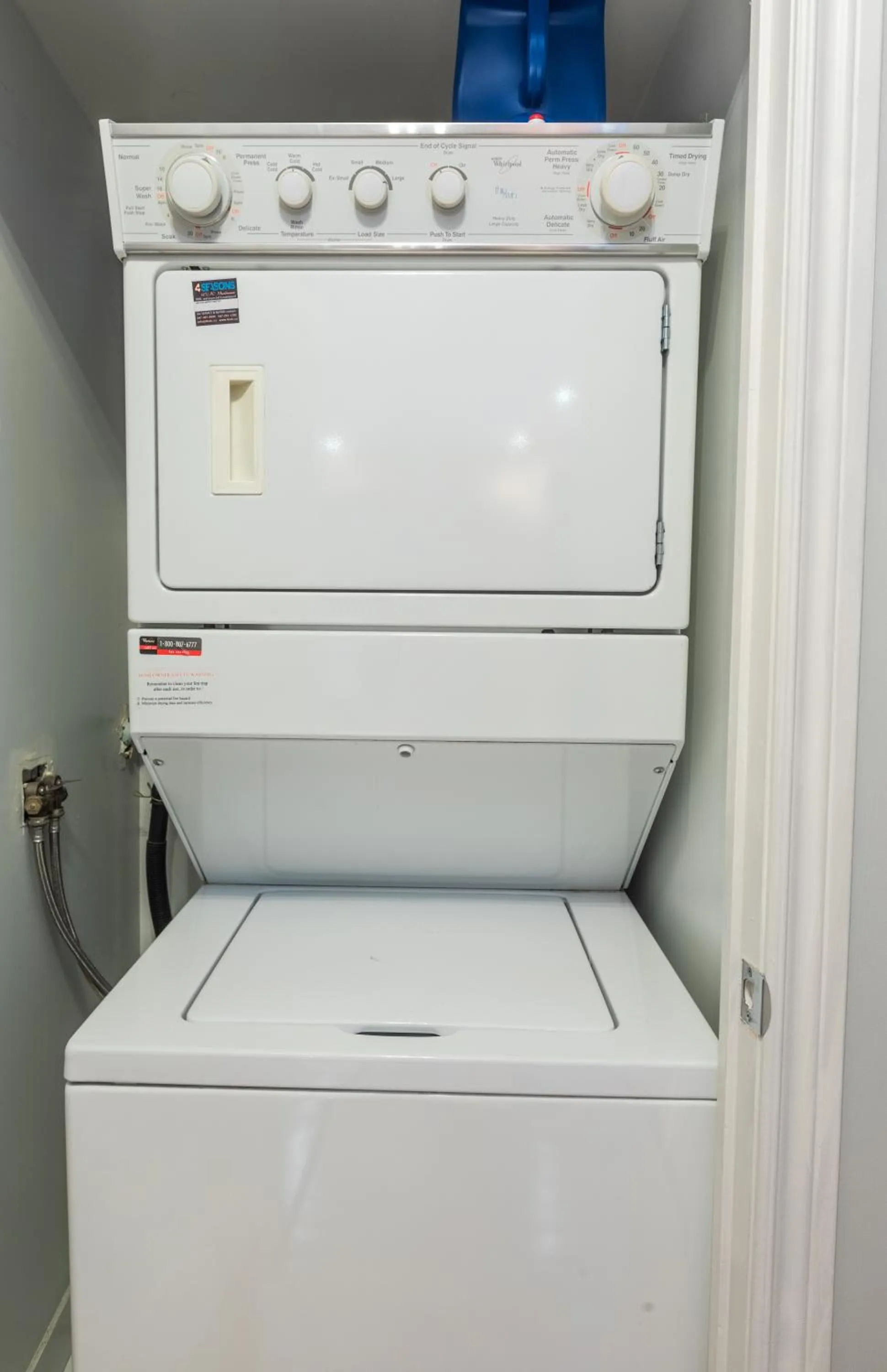 washing machine in AOC Suites - Heart of Downtown Condo