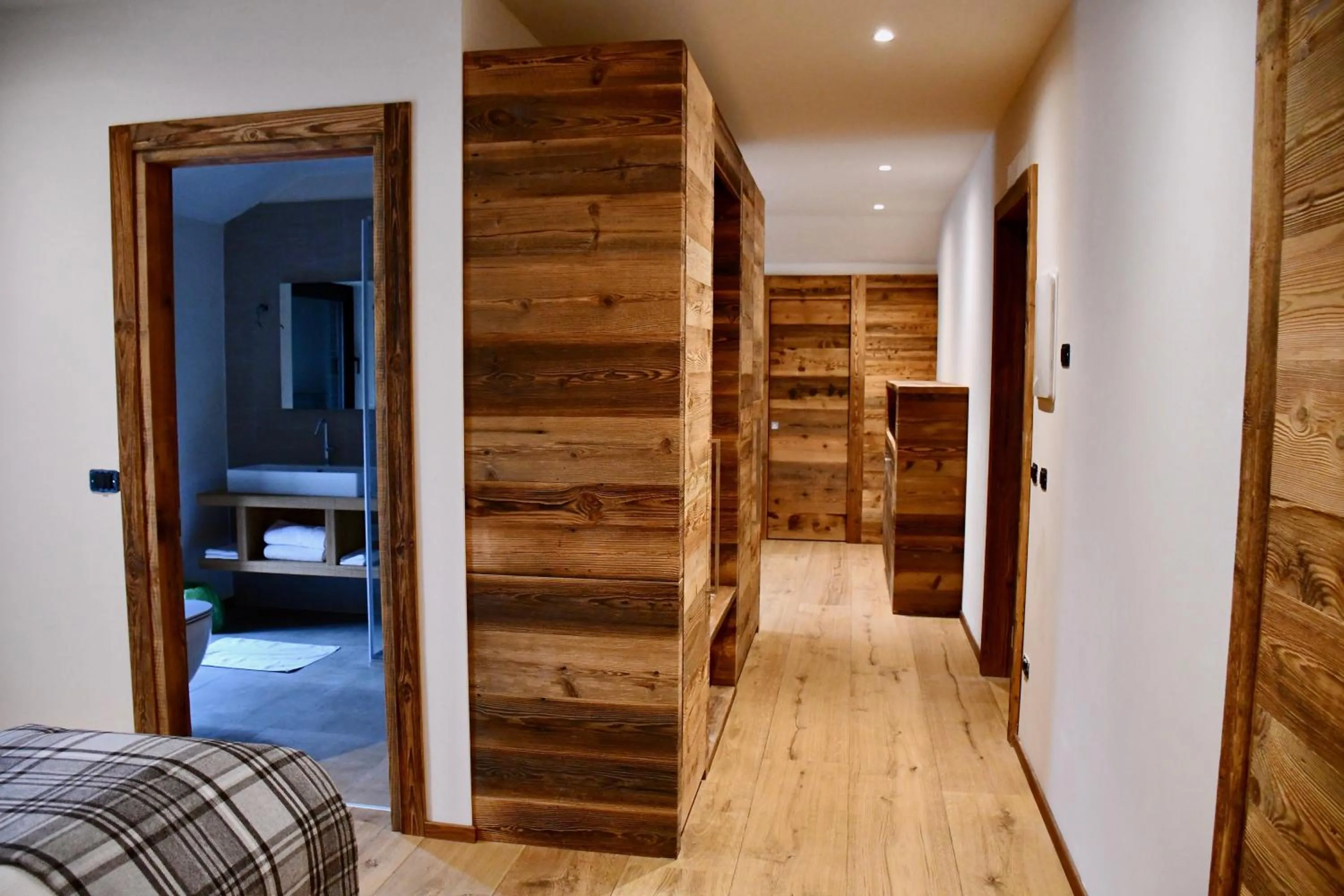 Living room, Bed in Hotel Alpenrose Wellness