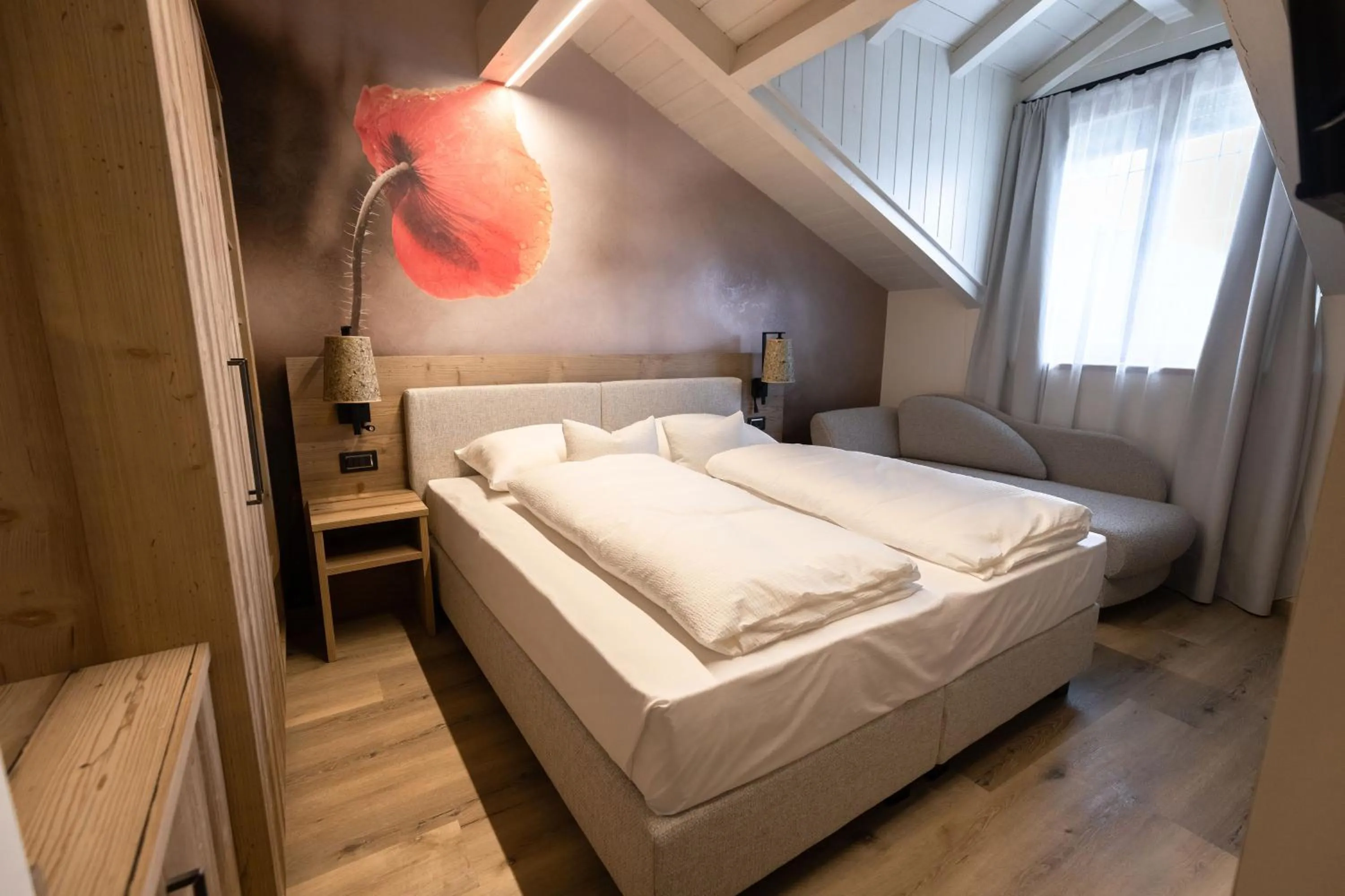 Bed in Hotel Alpenrose Wellness