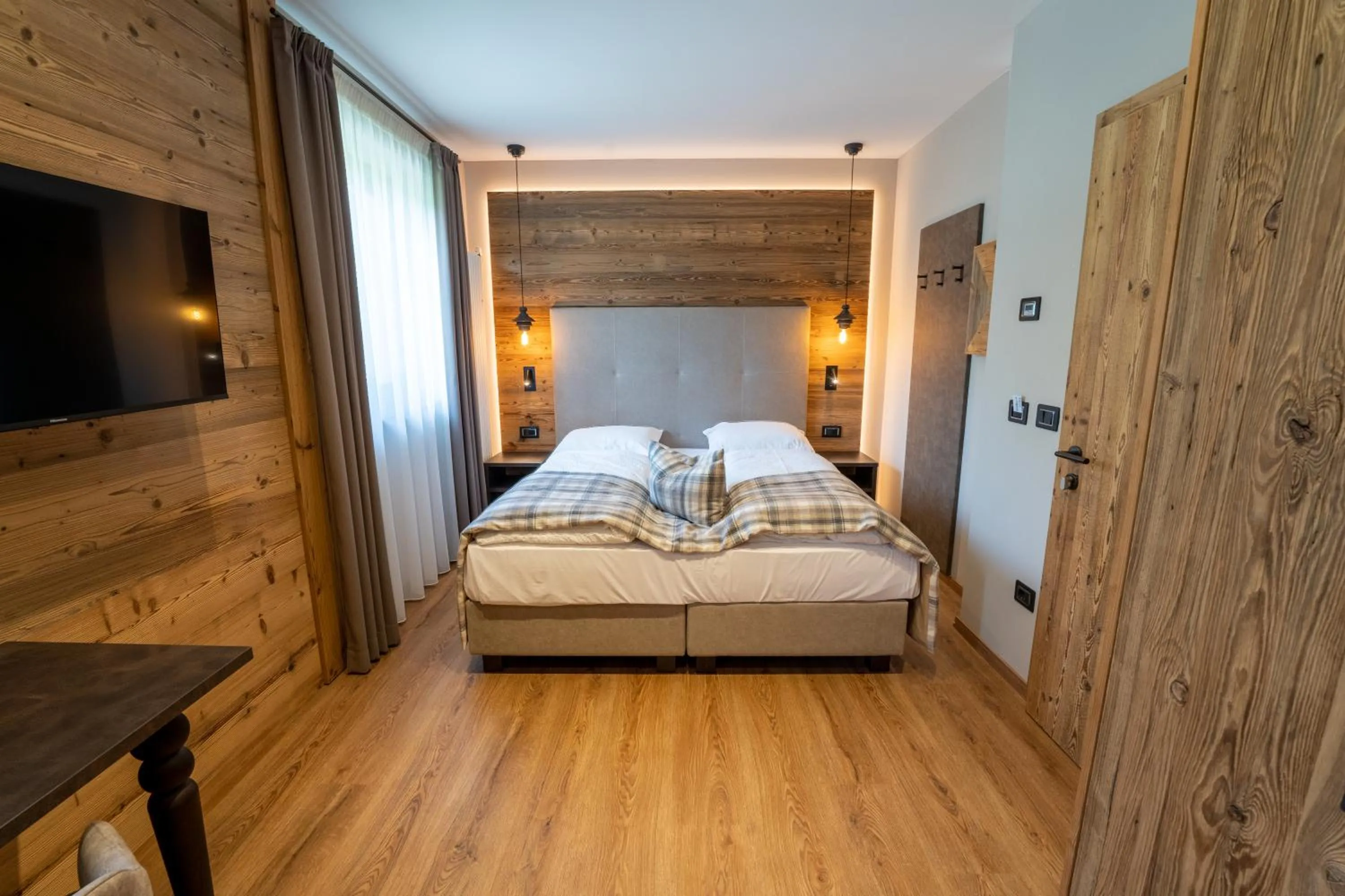 Bedroom, Bed in Hotel Alpenrose Wellness