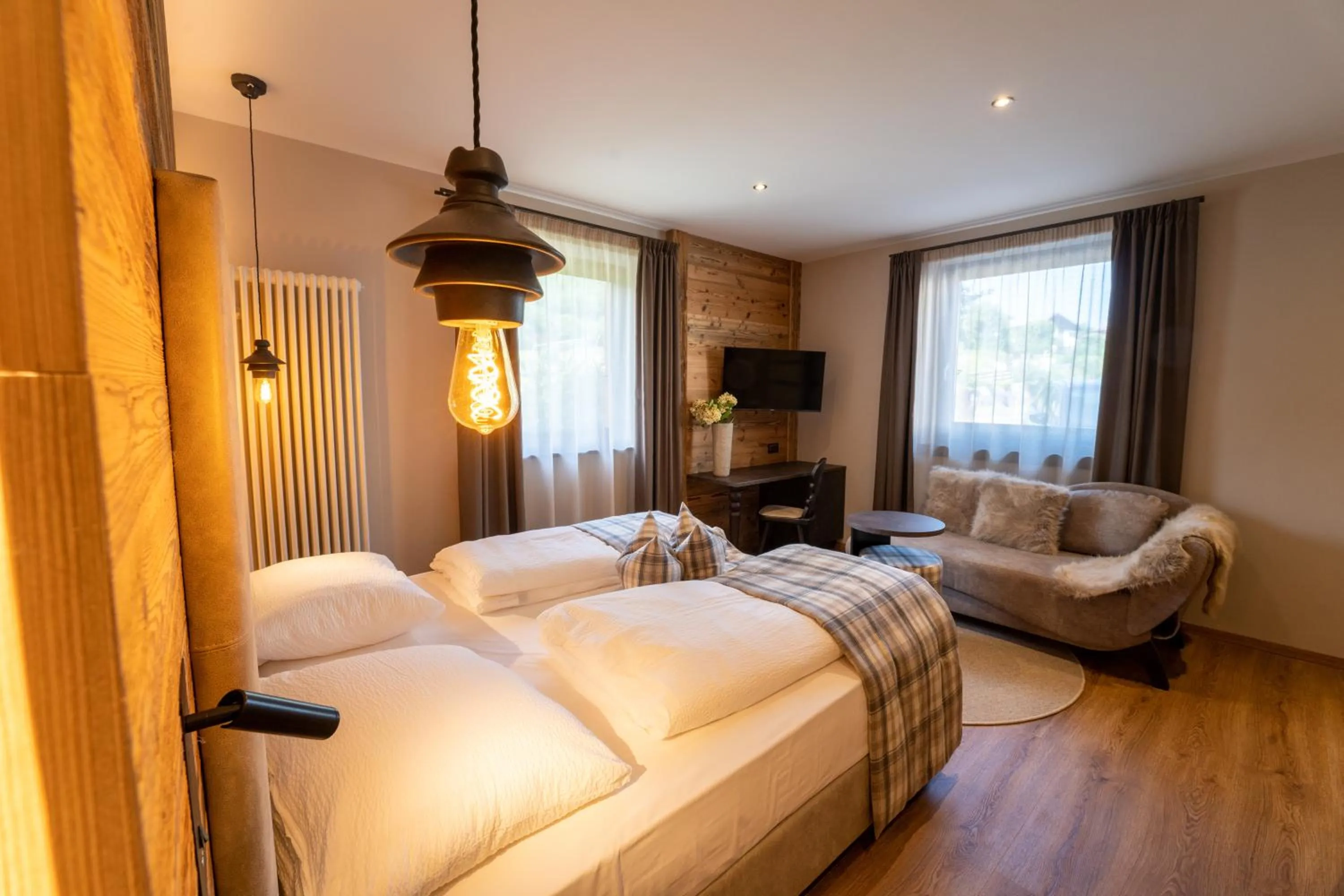 Bedroom, Bed in Hotel Alpenrose Wellness