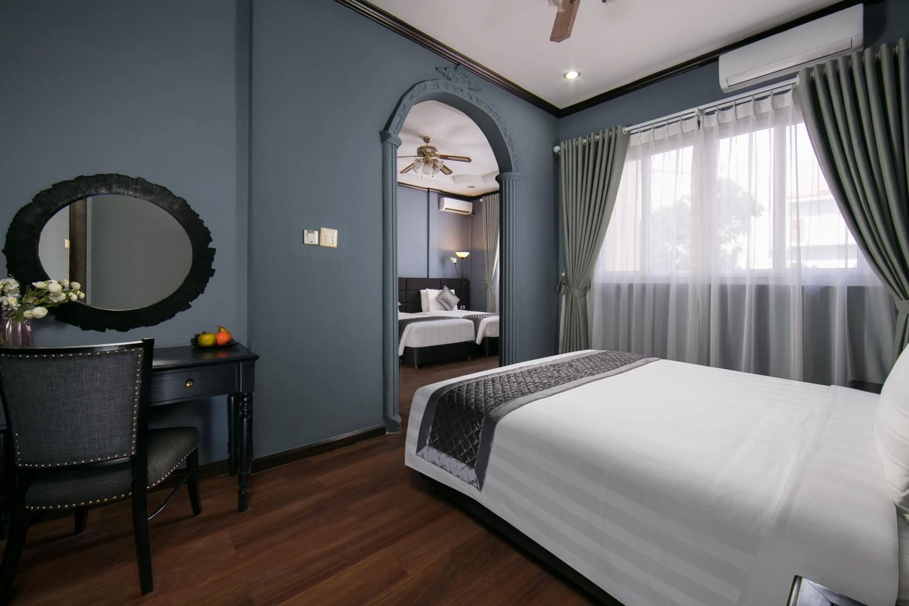 Photo of the whole room, Bed in Vientiane Boutique Hotel