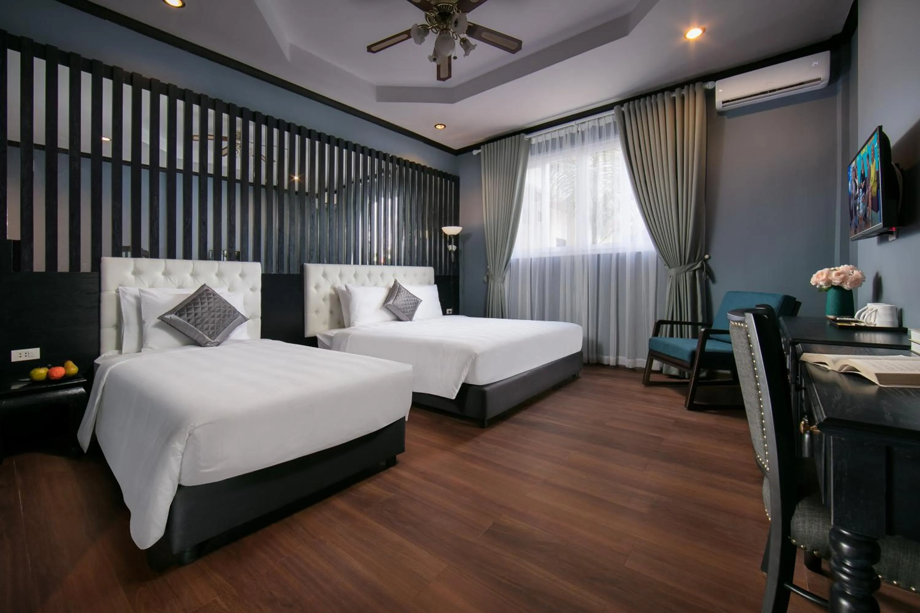 Photo of the whole room, Bed in Vientiane Boutique Hotel