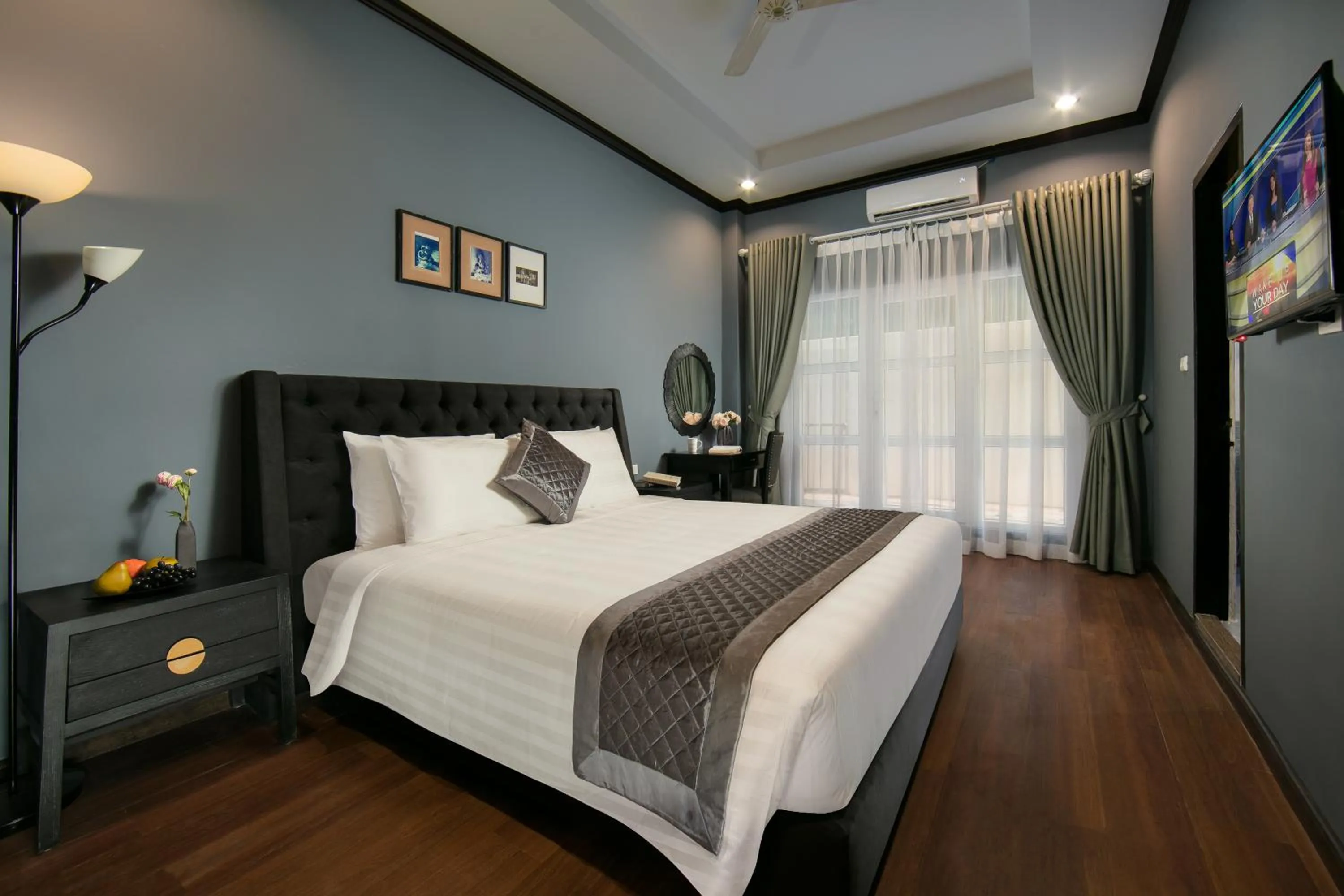 Photo of the whole room, Bed in Vientiane Boutique Hotel