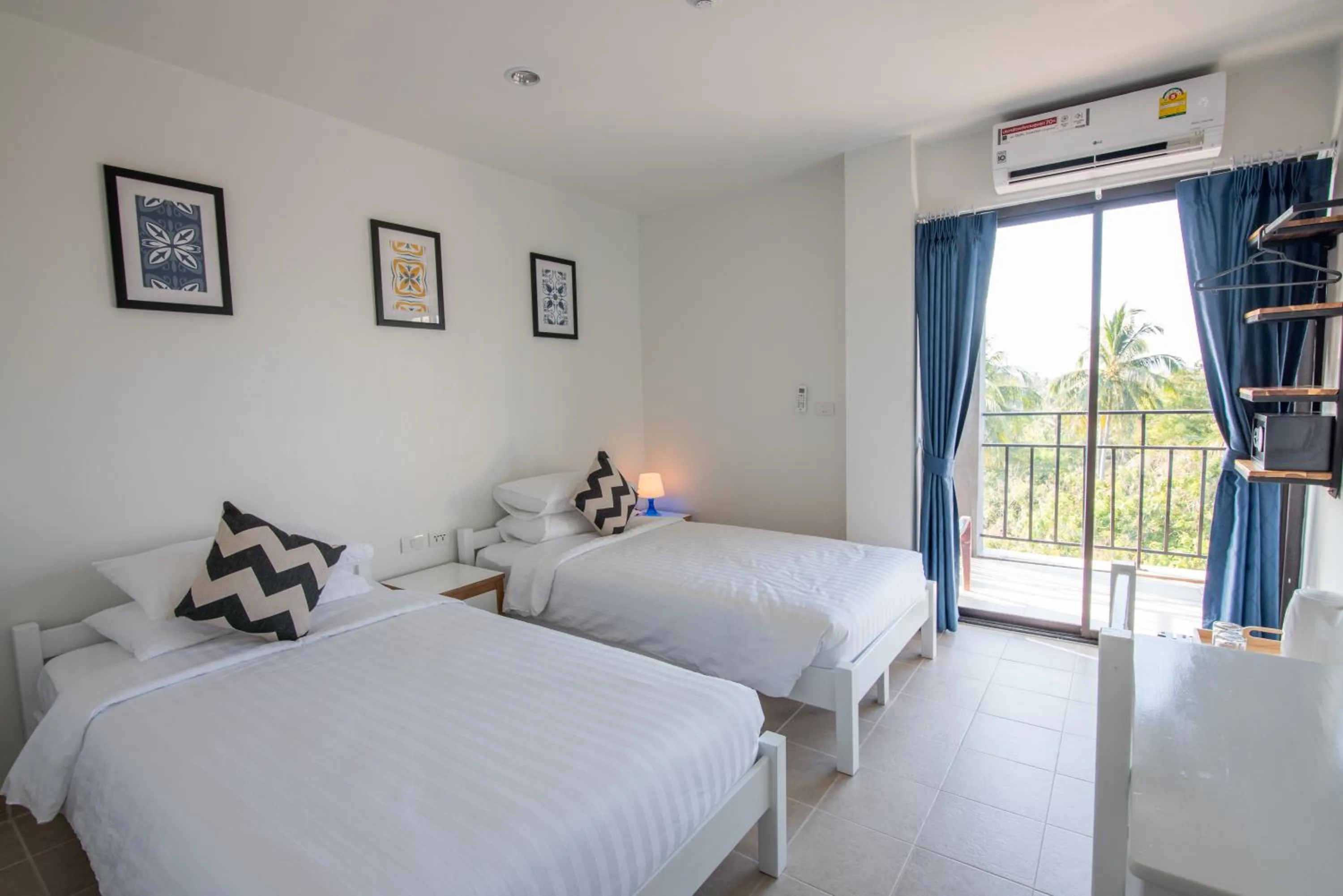 Photo of the whole room, Bed in Maikhao Hotel, Phuket