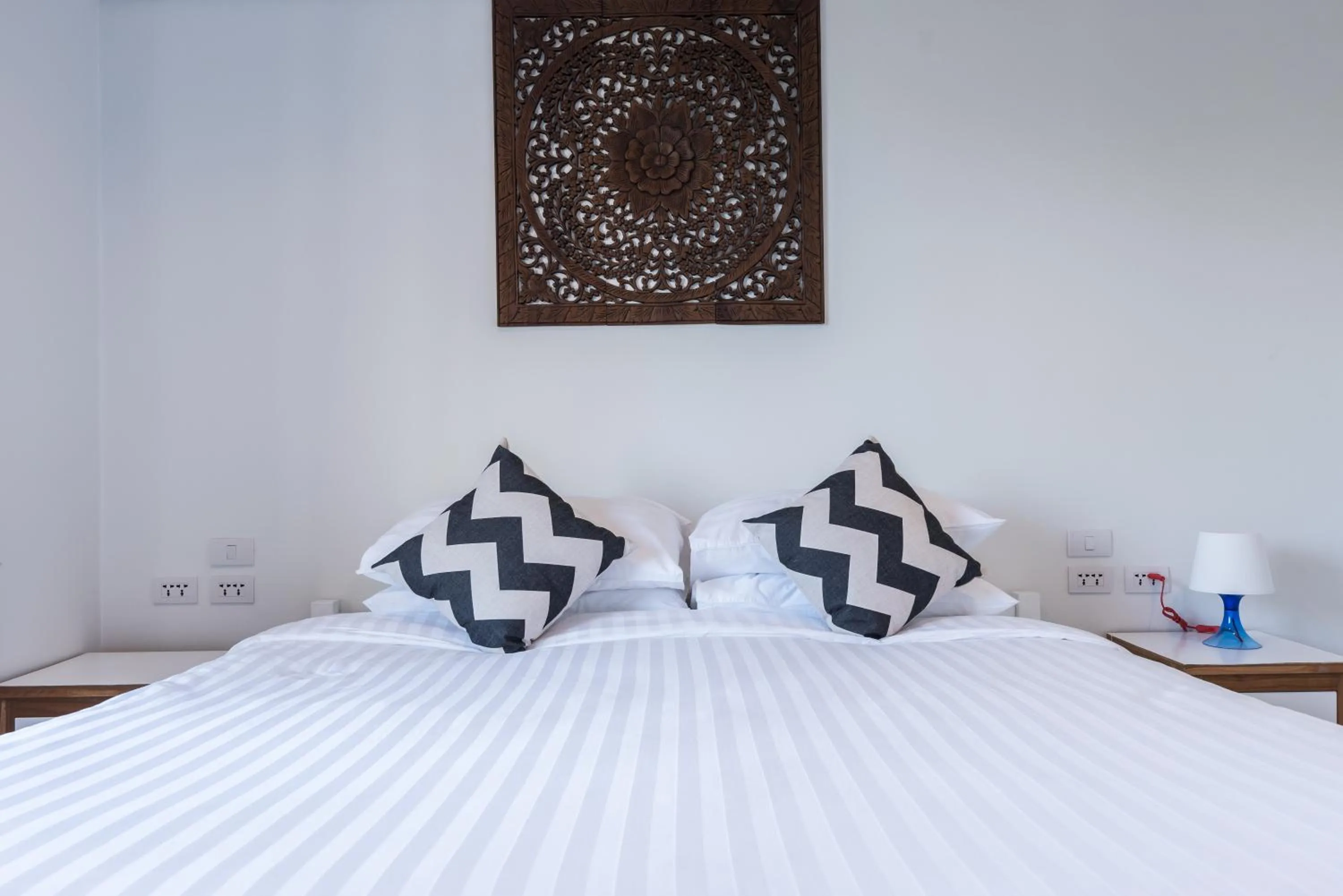 Bed in Maikhao Hotel, Phuket