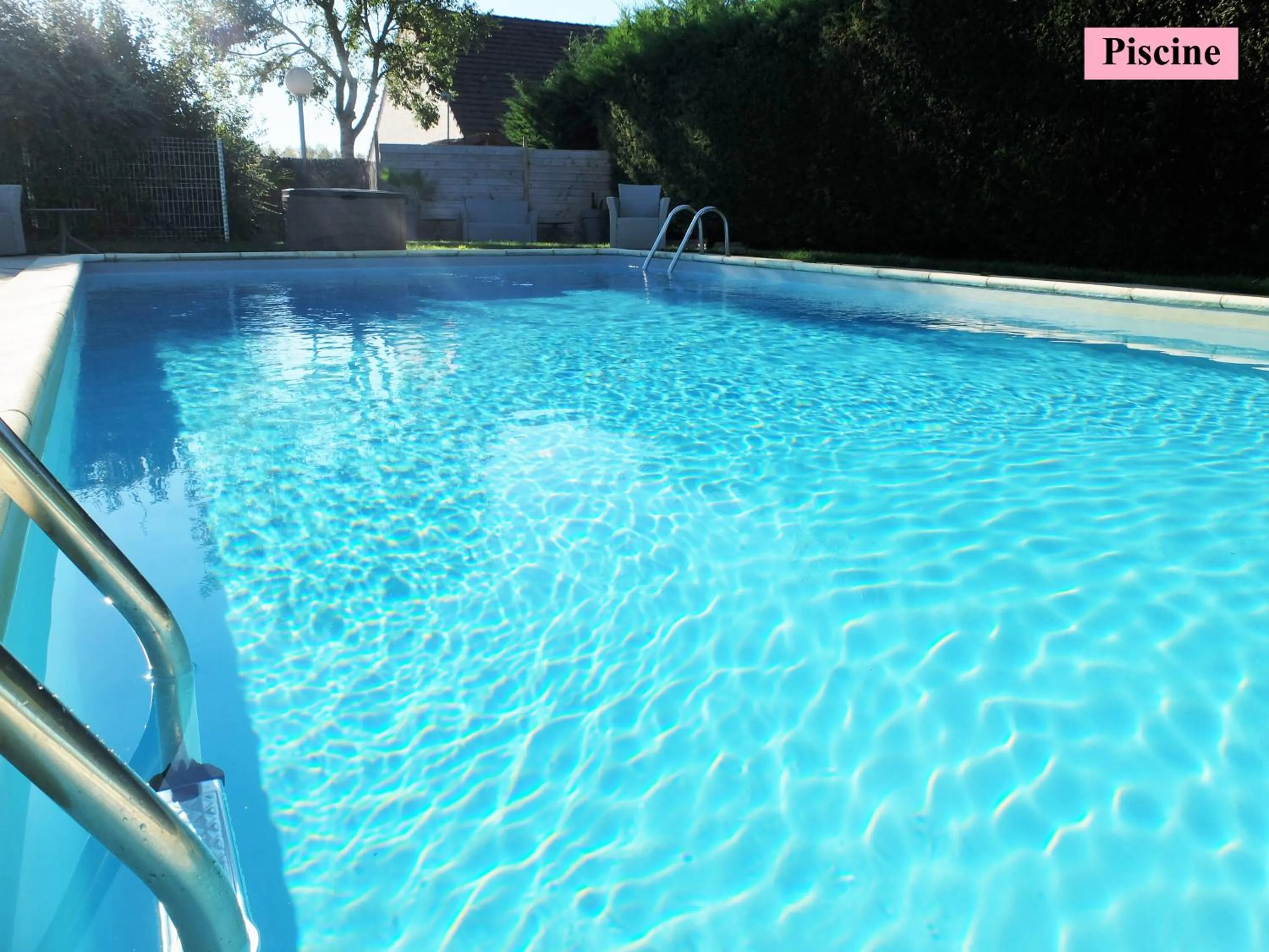 Swimming pool in Hôtel Le Clos Badan