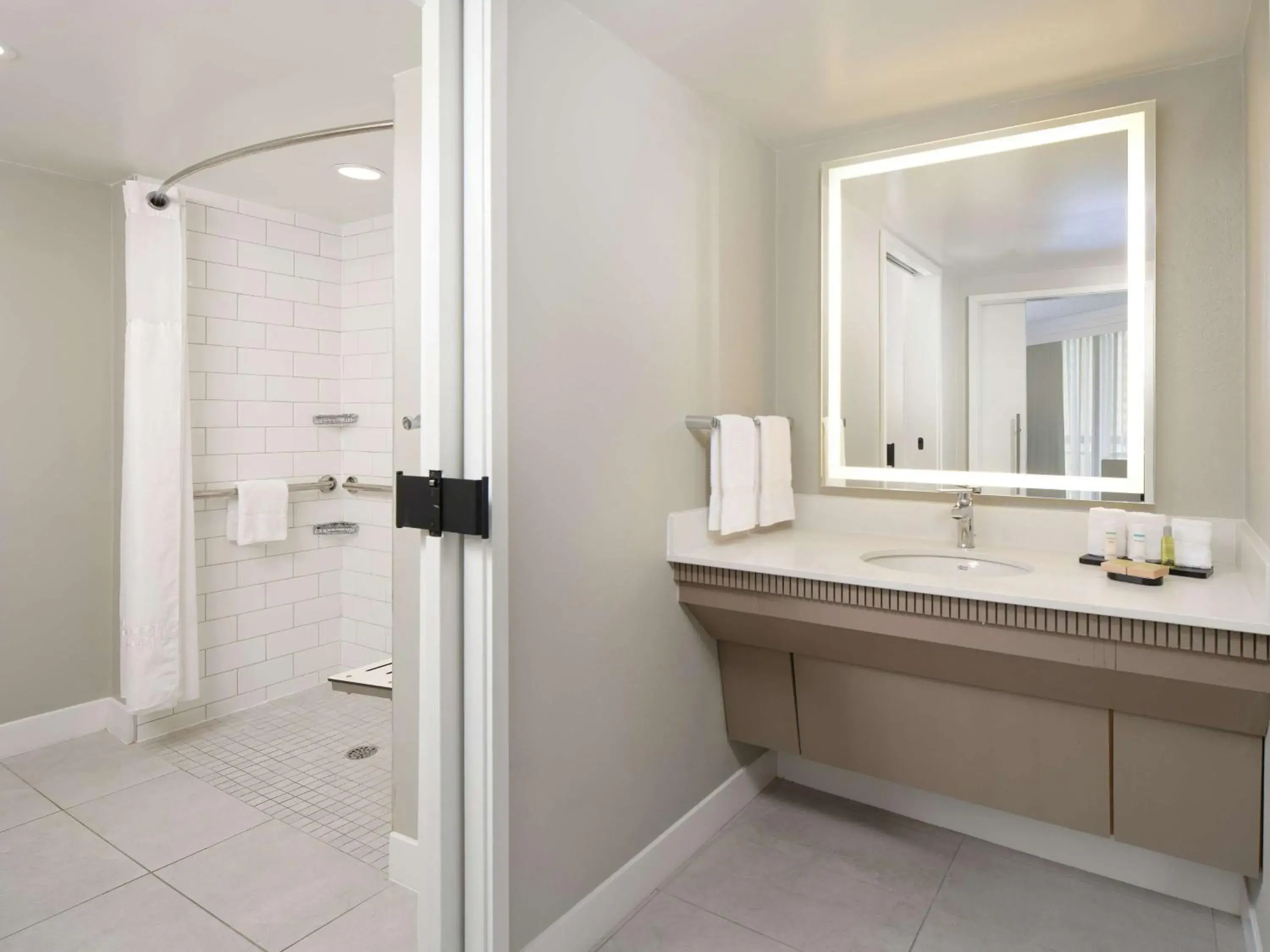 Bathroom in Embassy Suites by Hilton Myrtle Beach Oceanfront Resort Bathroom in Embassy Suites by Hilton Myrtle Beach Oceanfront Resort