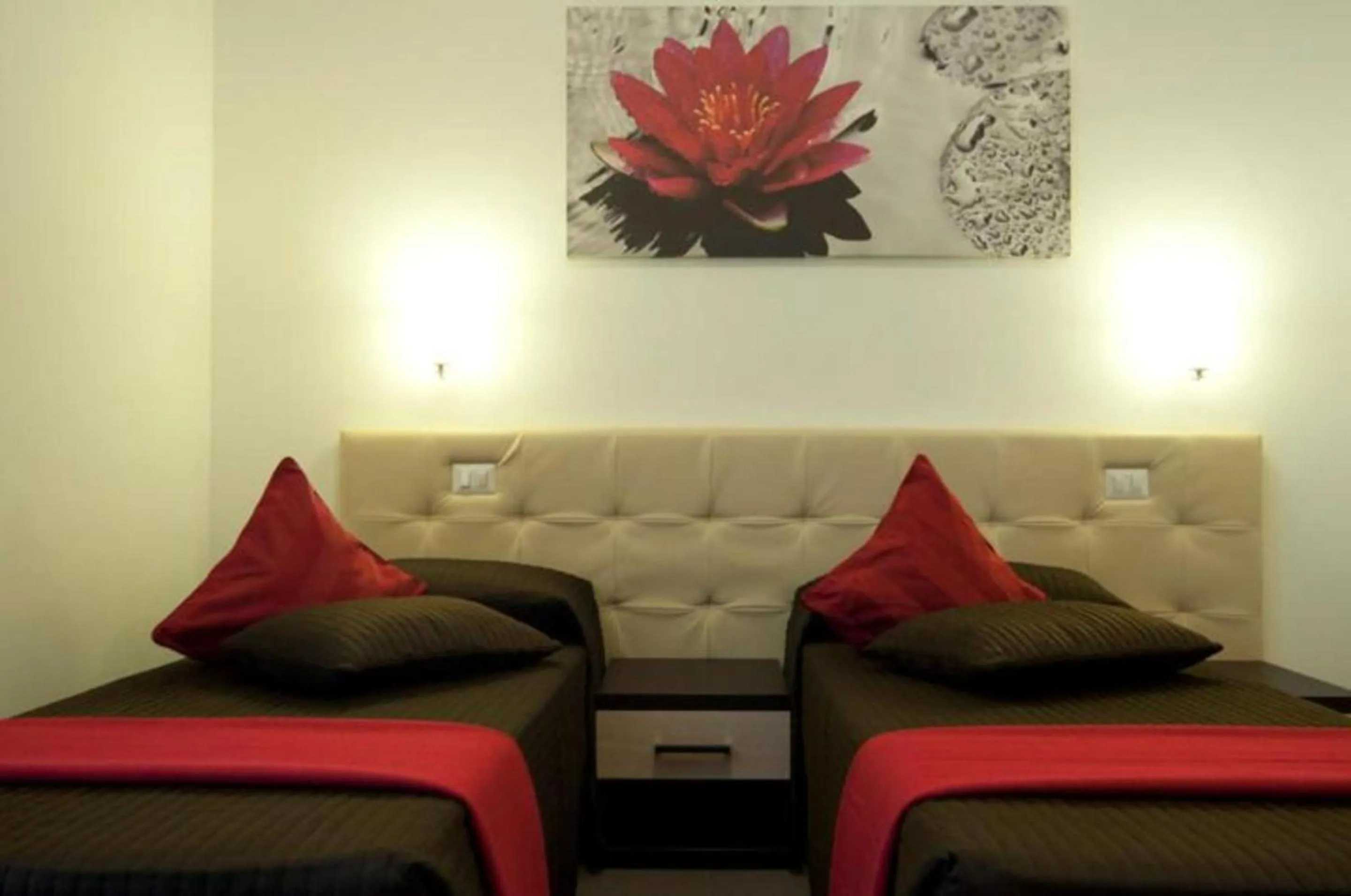 Bed in Ara Pacis Inn