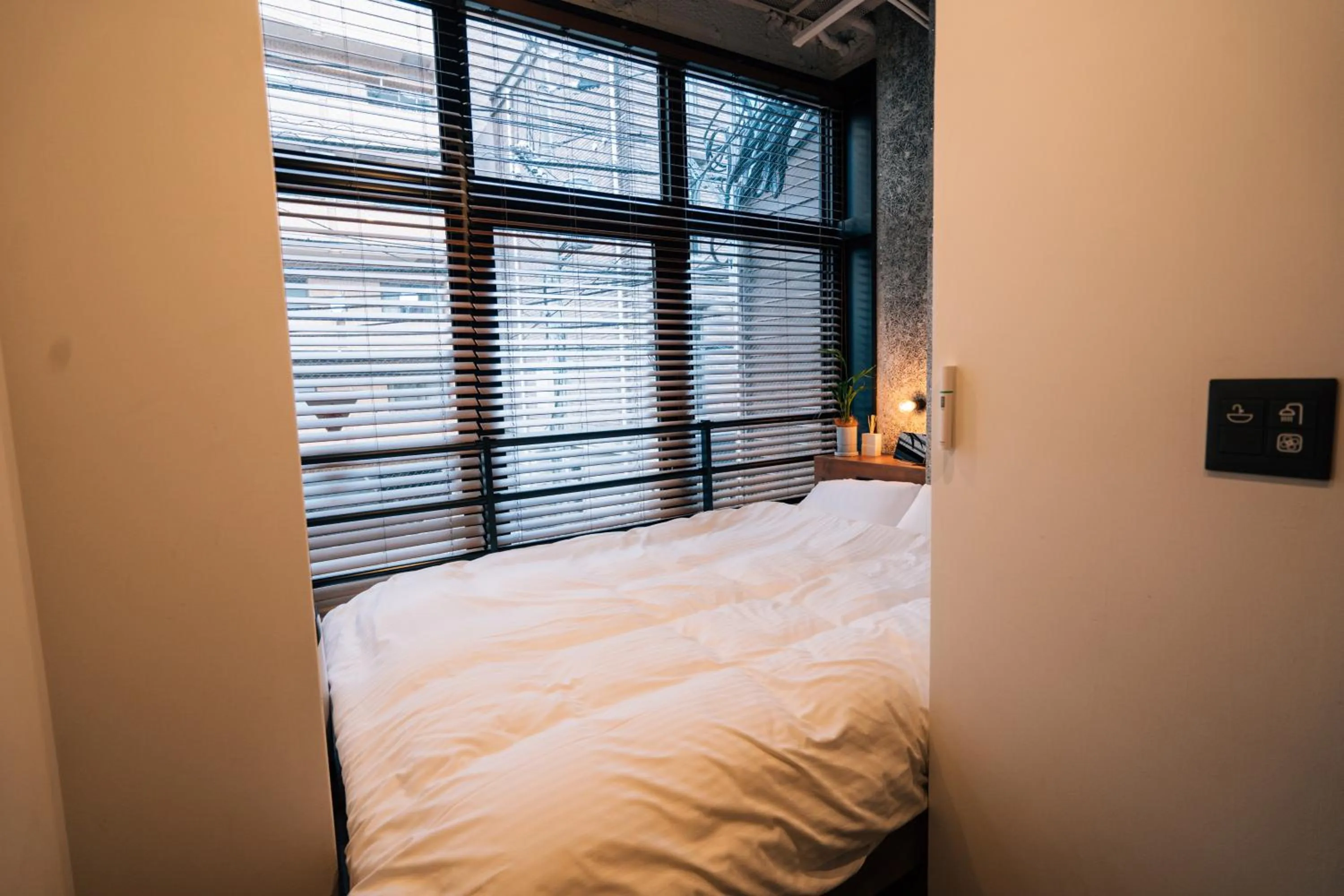 Bedroom, Bed in mizuka Daimyo 4 - unmanned hotel -