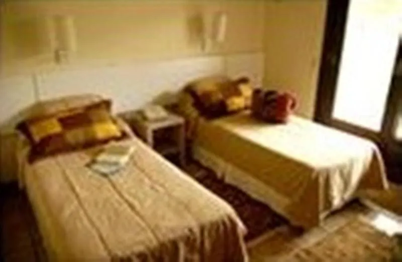 Bed in Palmas Hotel & Spa