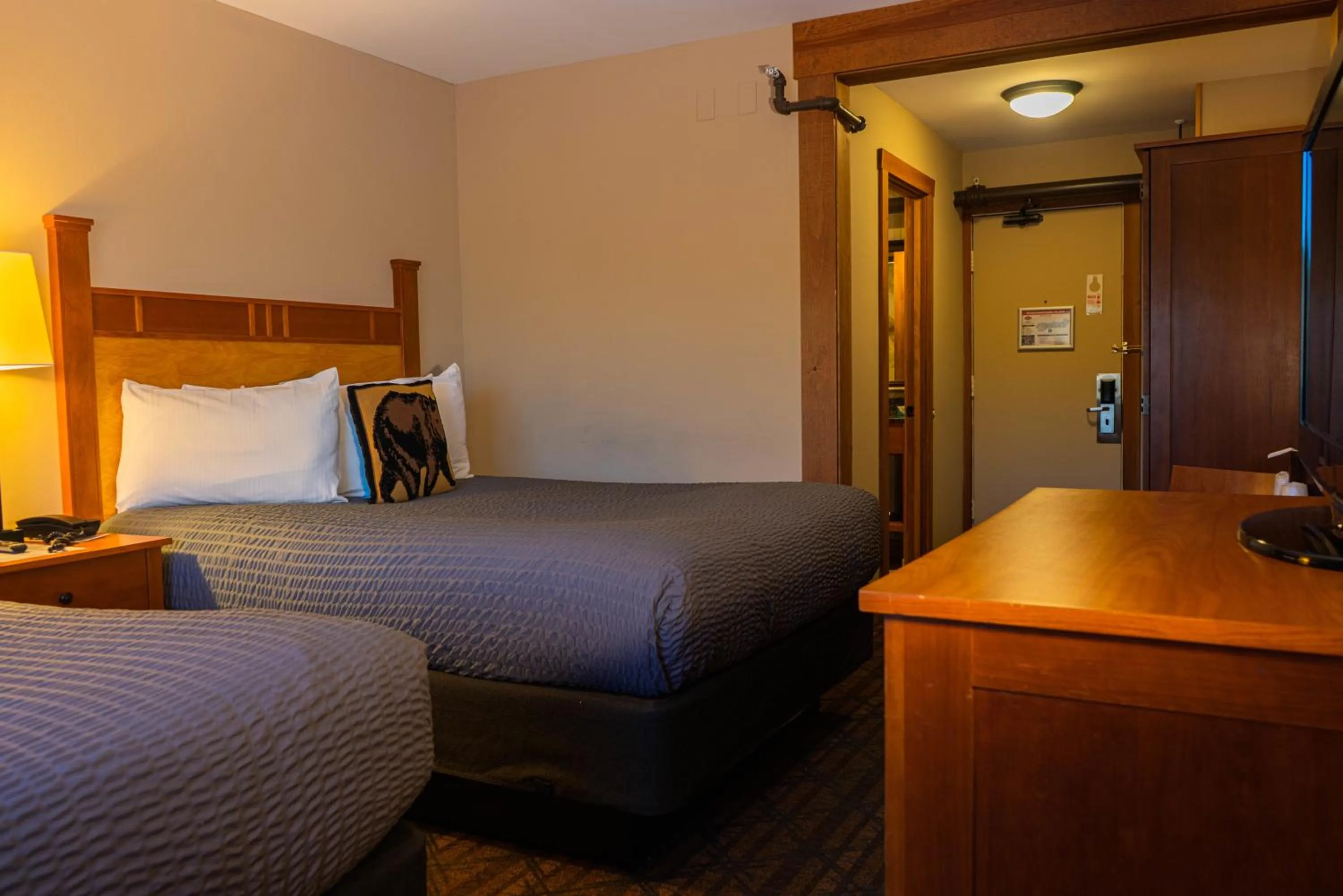 Bed in The Black Bear Lodge at Stratton Mountain Resort