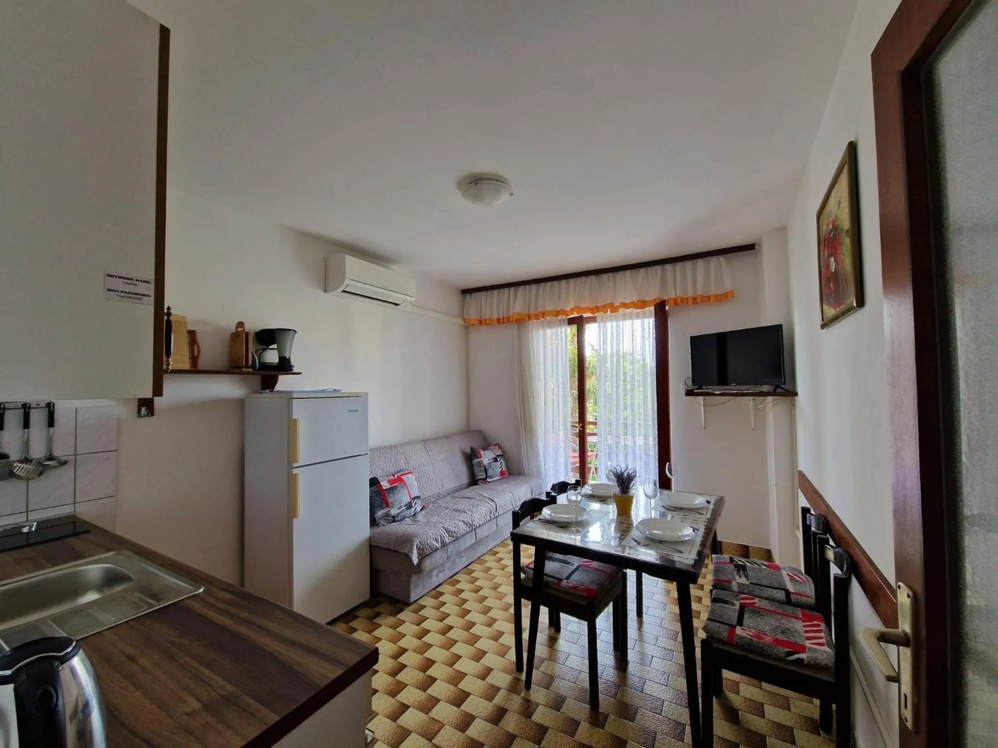 Communal lounge/ TV room in Apartments Filosevic by El-Pi Tours