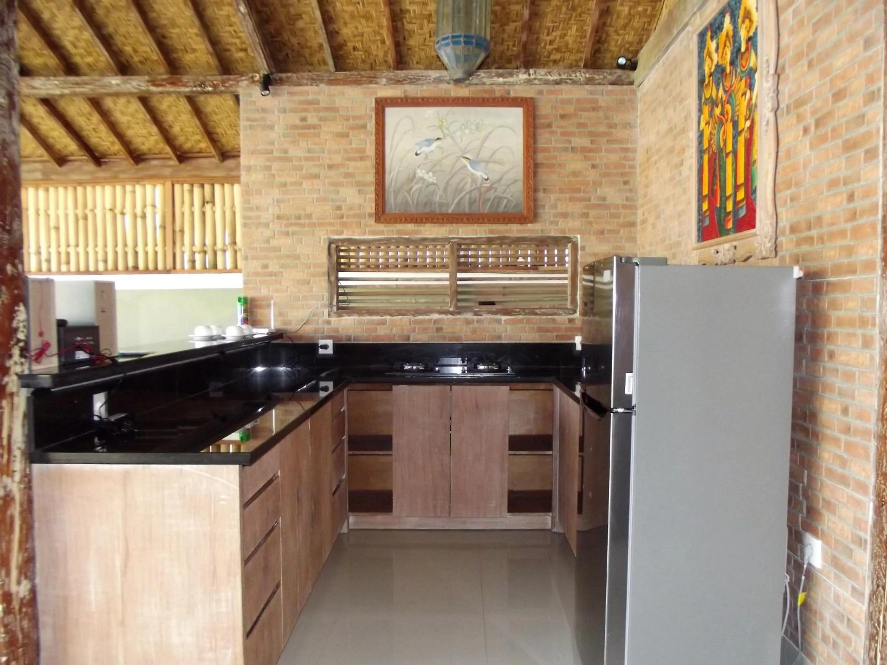 Communal kitchen in The Lakshmi Villas by The Beach House
