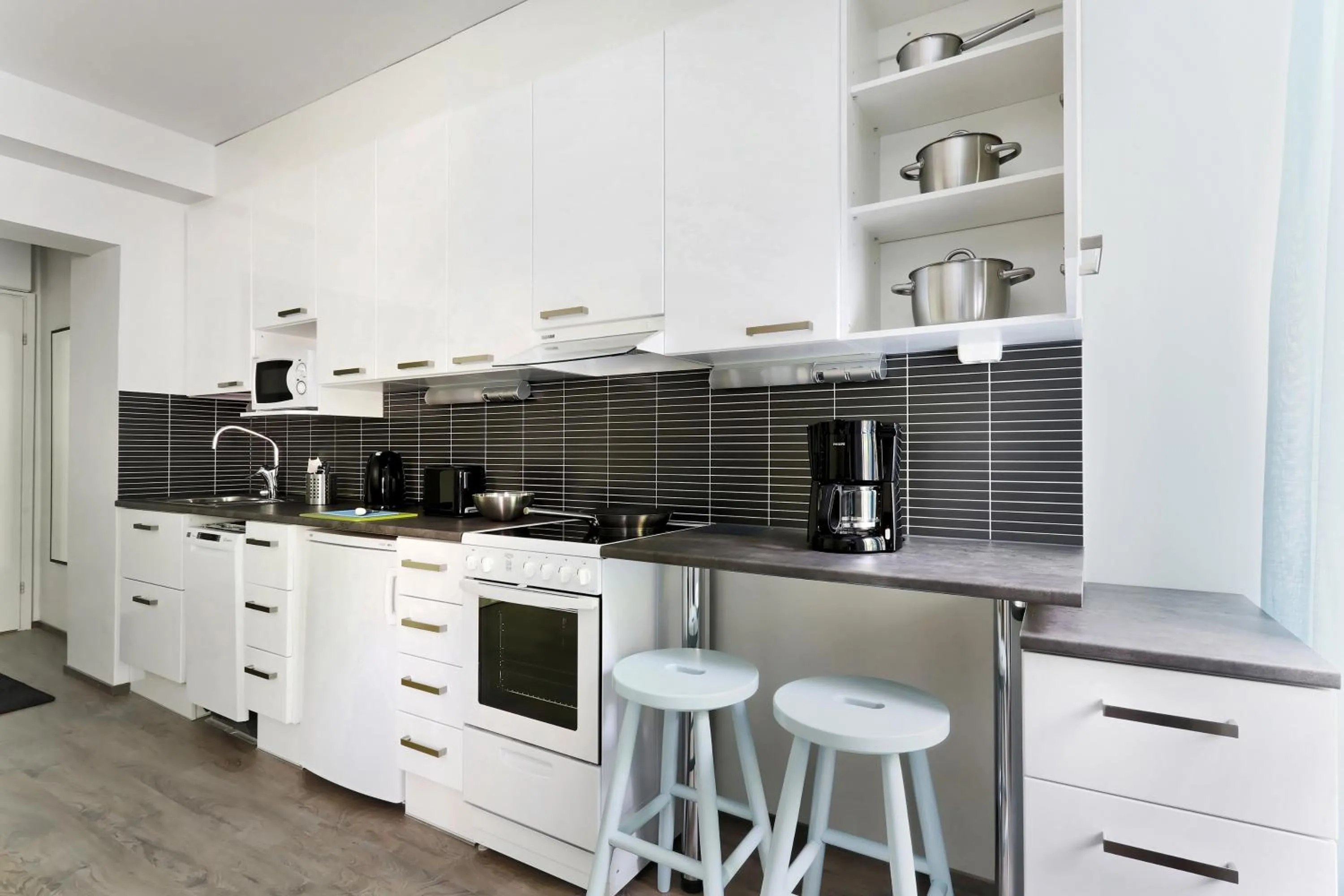 Kitchen or kitchenette in Forenom Serviced Apartments Helsinki Lapinlahdenkatu