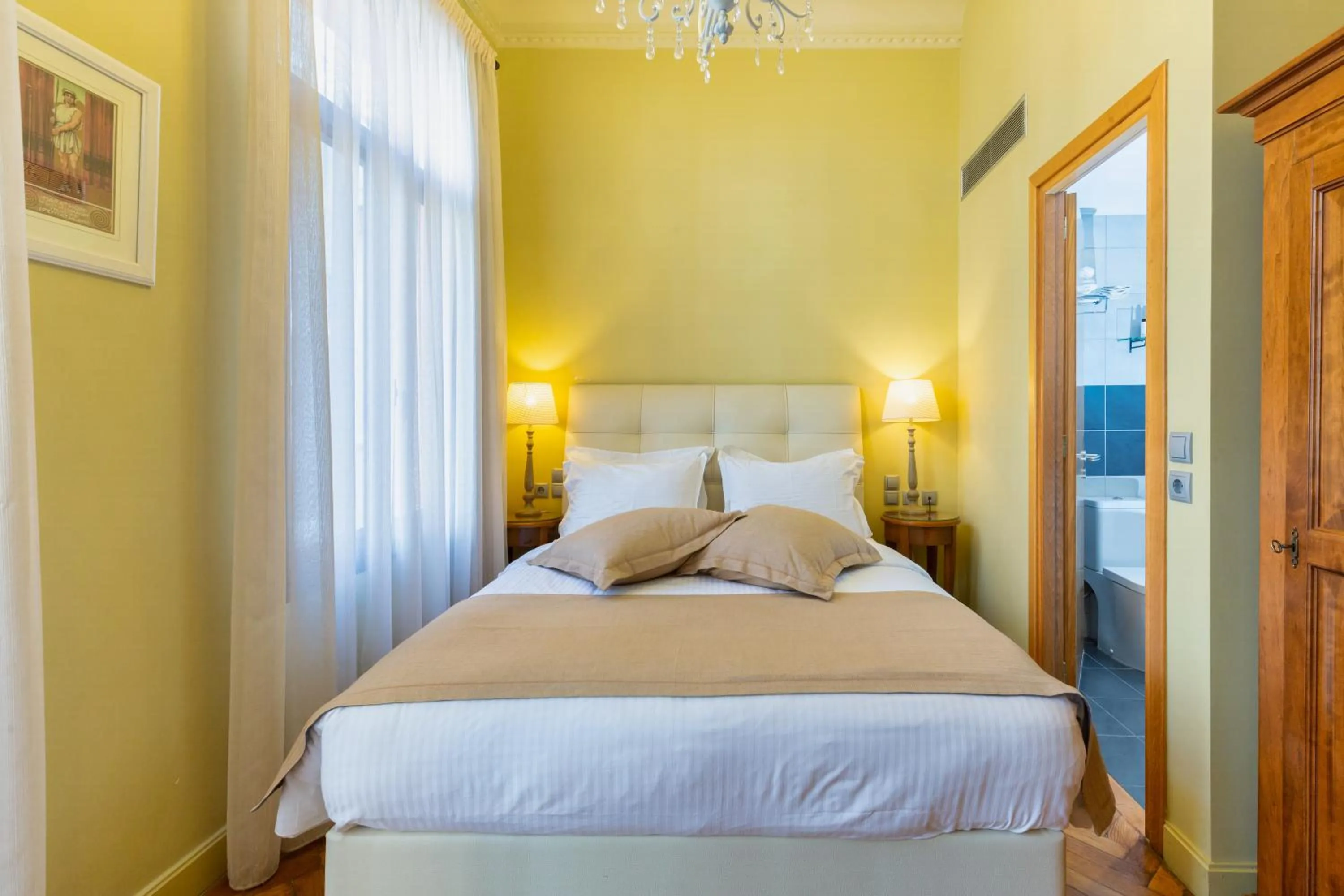 Bed in Sweet Home Hotel