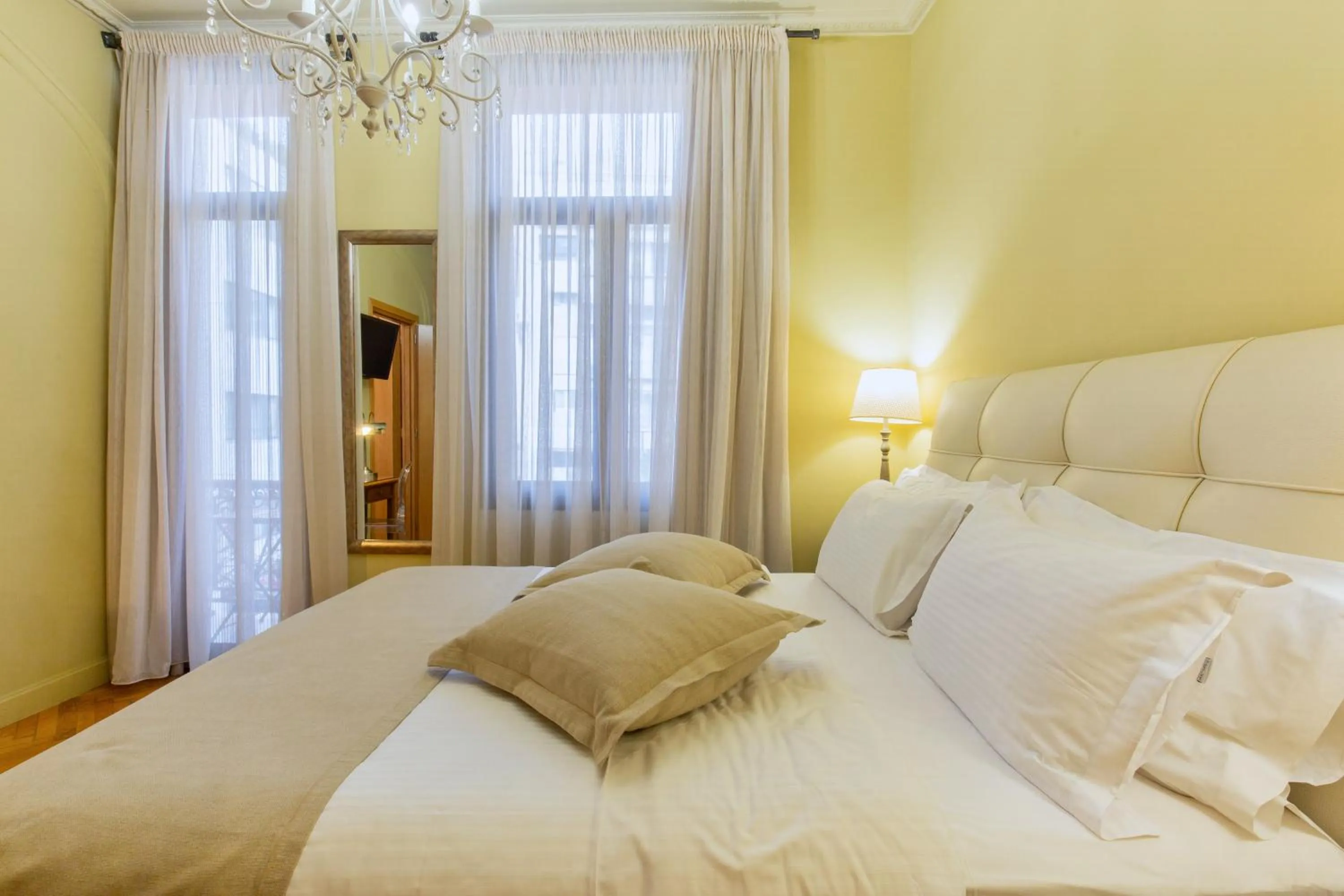 Bed in Sweet Home Hotel