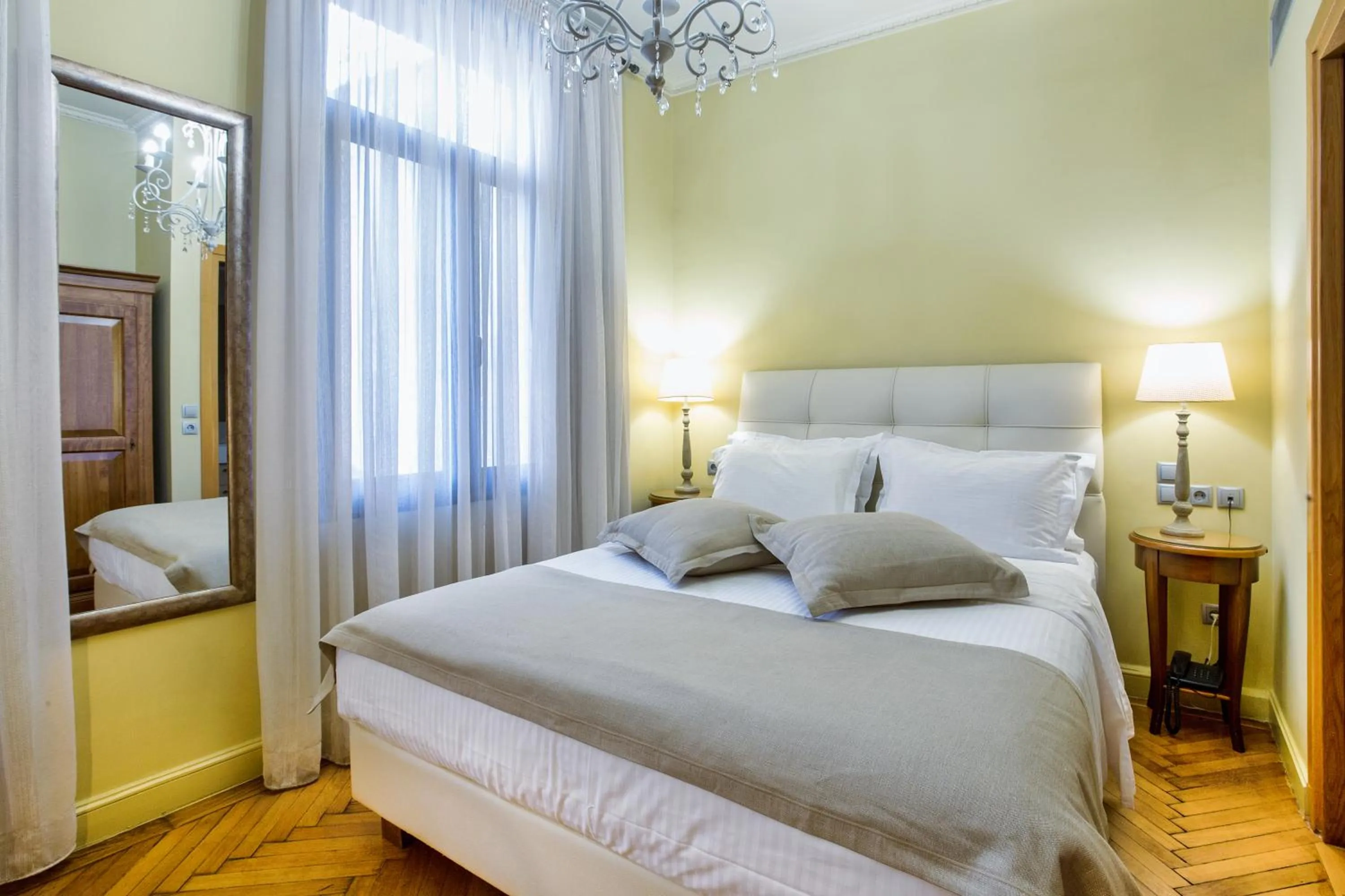 Bed in Sweet Home Hotel