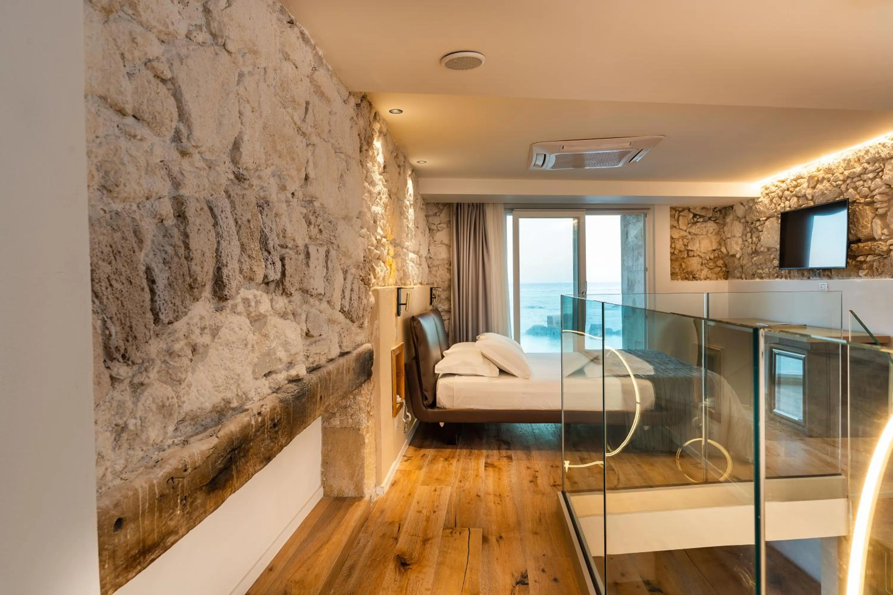 Bed in Re Dionisio Luxury Suites