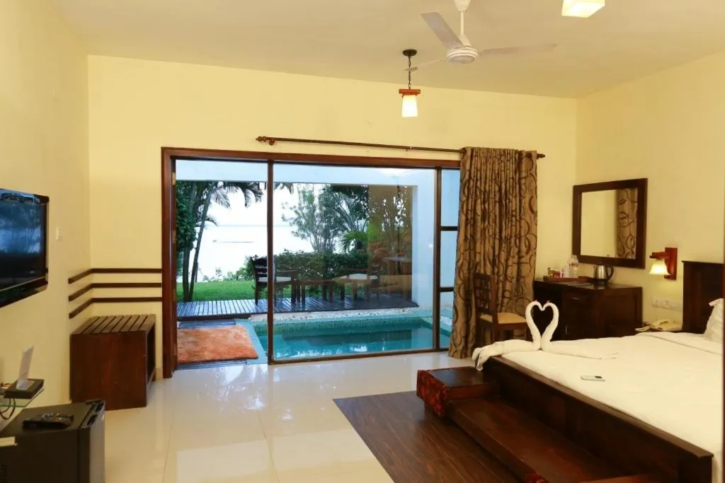 Pool view, Bed in Deshadan Backwater Resort - The best sunrise view