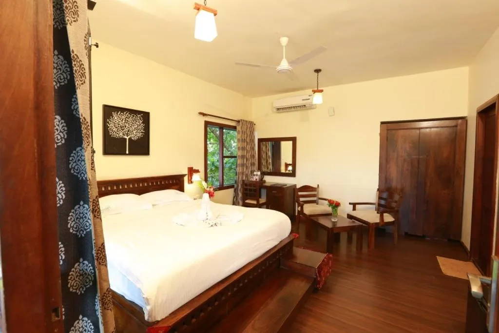 Bed in Deshadan Backwater Resort - The best sunrise view