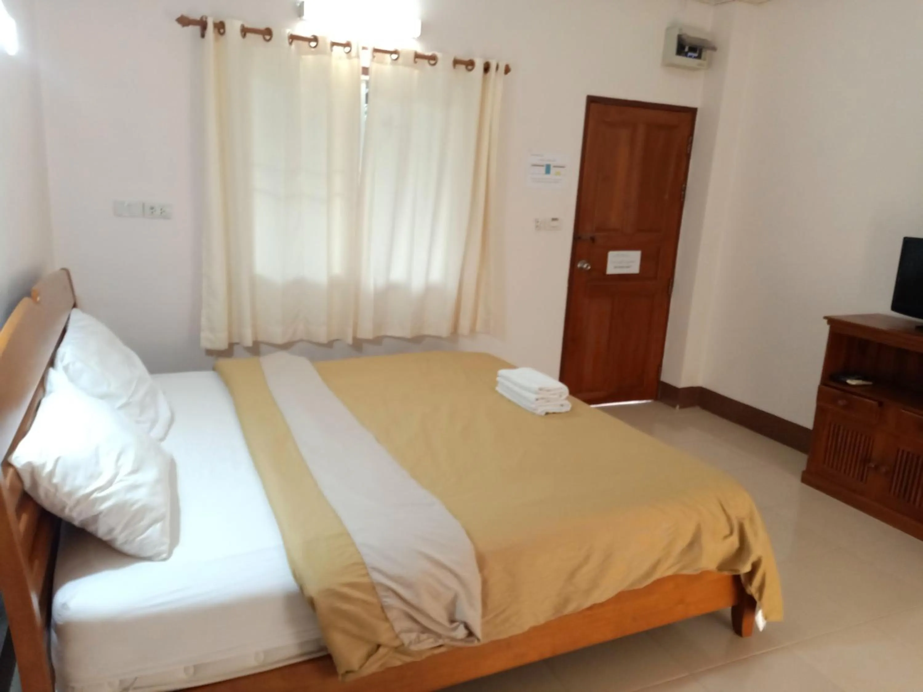 Bed in Phumchan Place Hotel